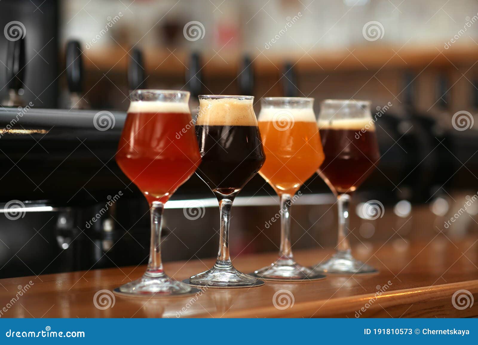 Beers In Glasses On Bar Counter Stock Image Image of alcohol, pilsner