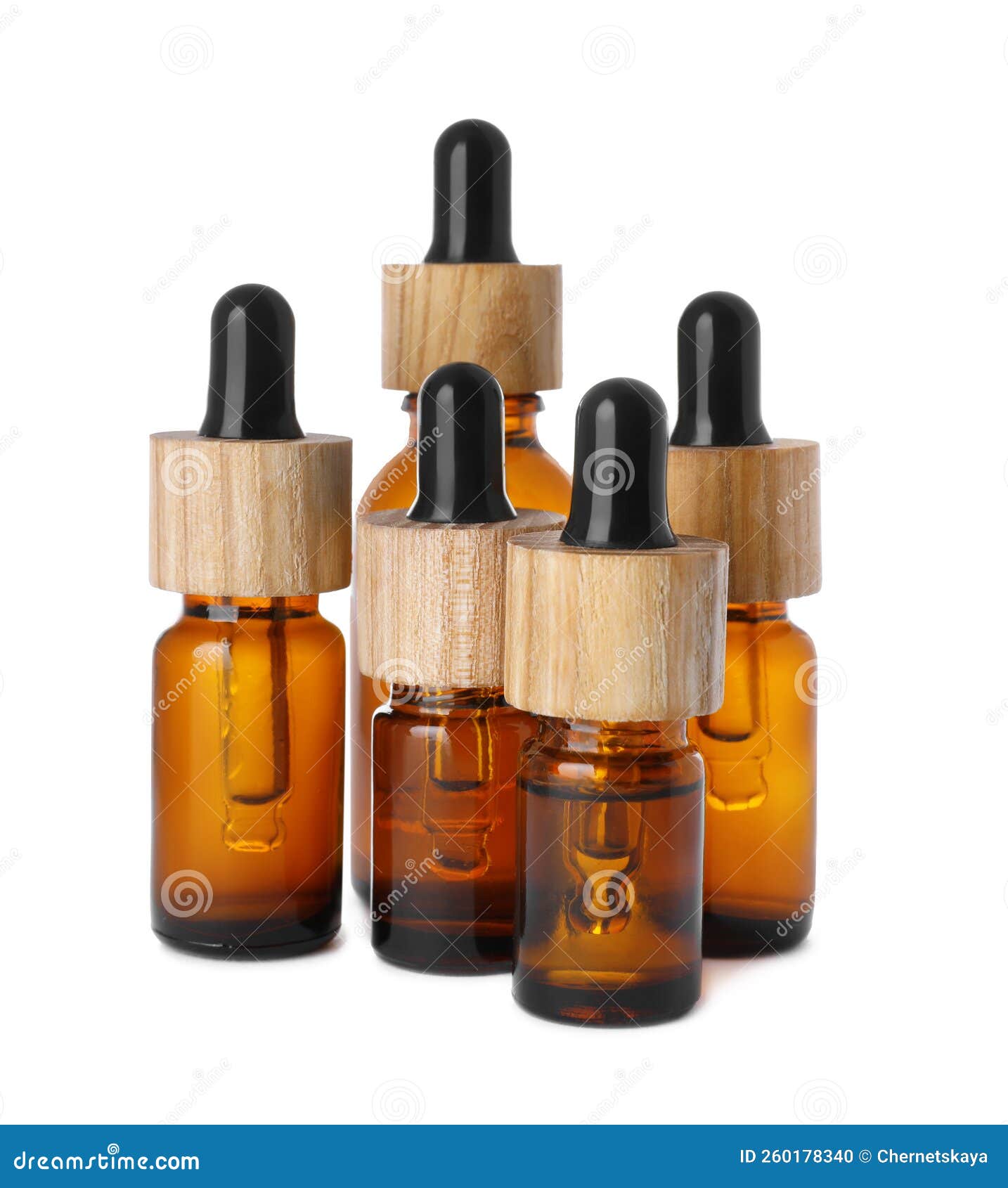 Different Bottles of Essential Oil on White Background Stock Photo