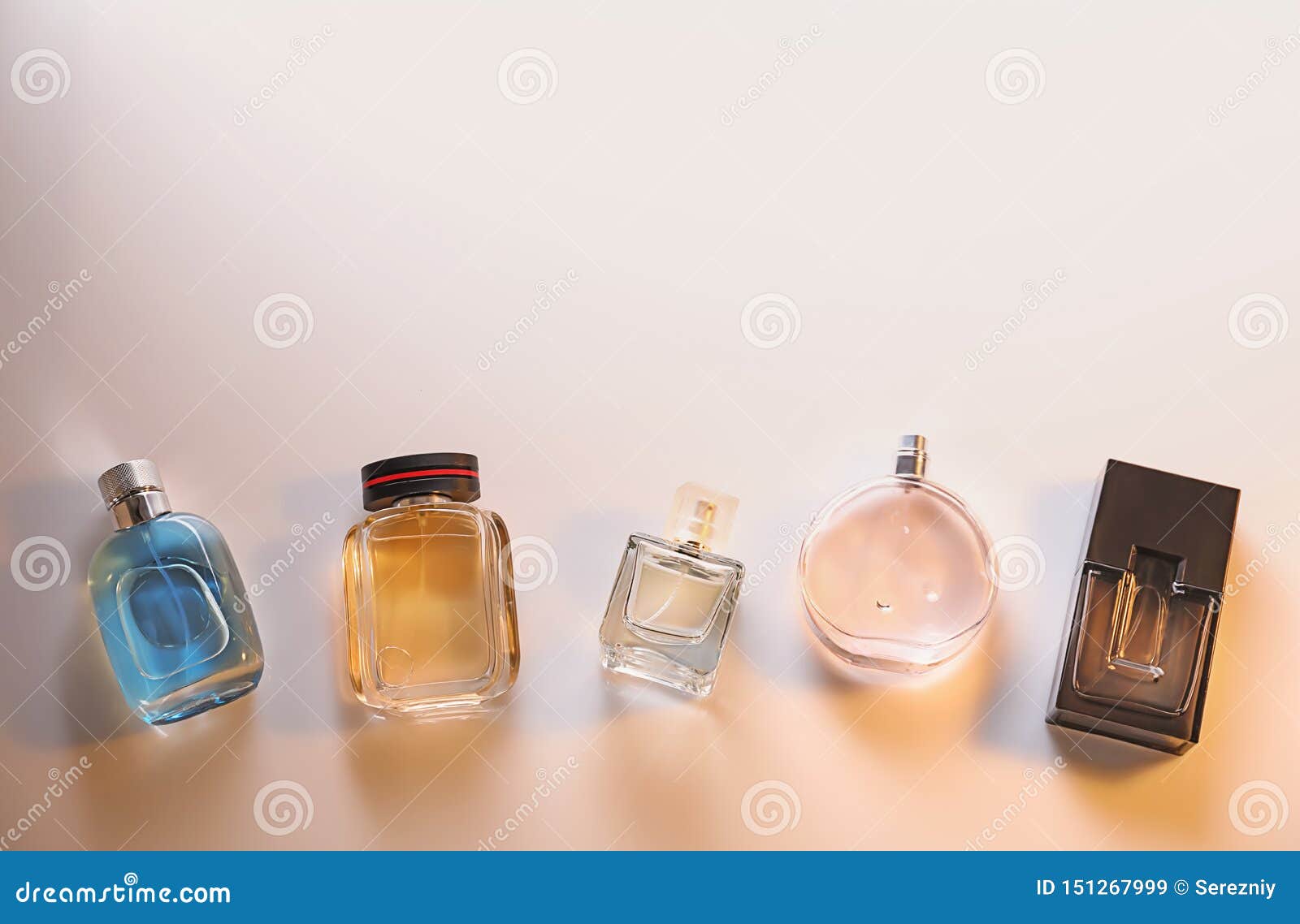 Different Bottles of Perfume on Light Background Stock Image Image of