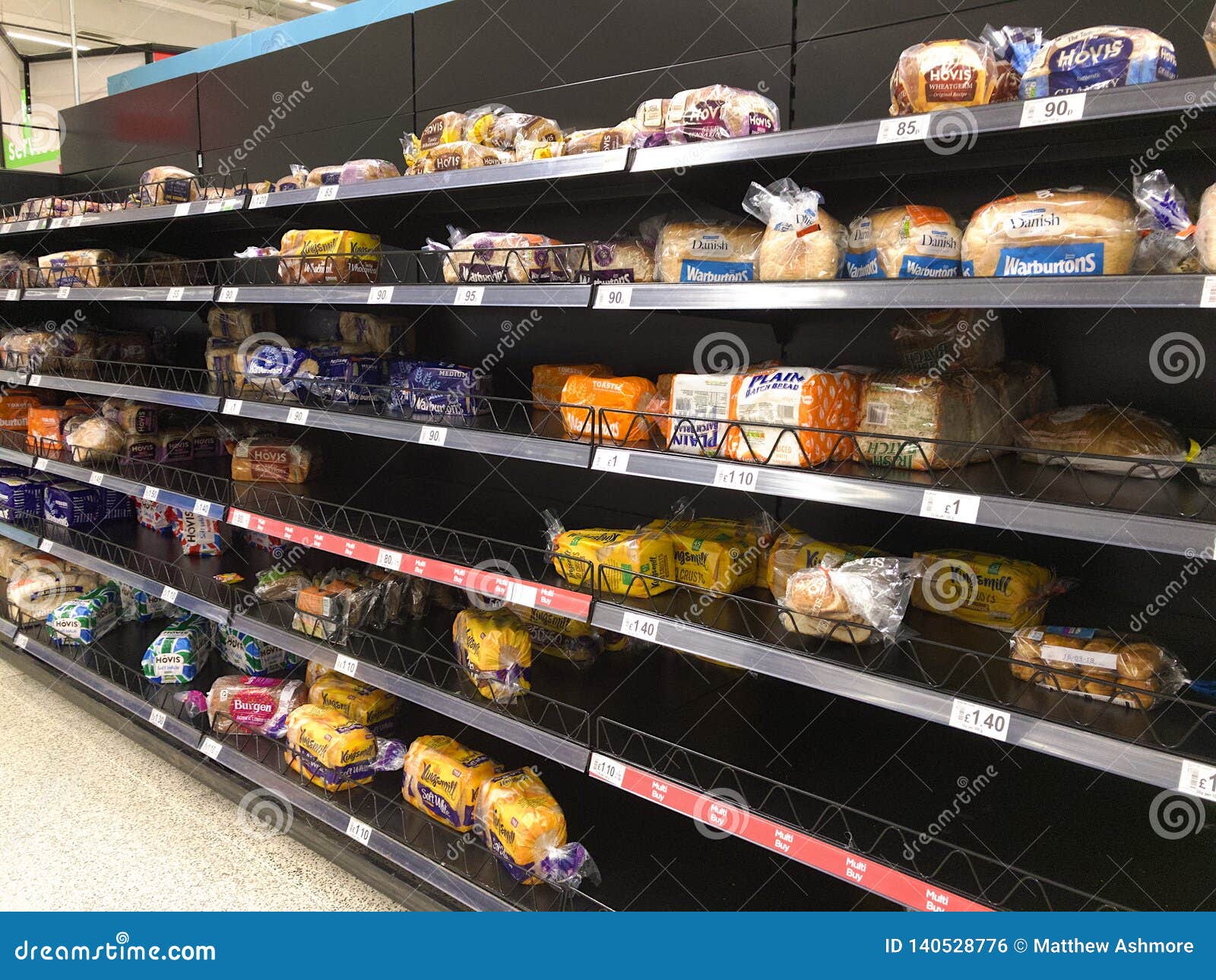 Bread Shelves in a Supermarket are Half Empty Editorial Photo Image