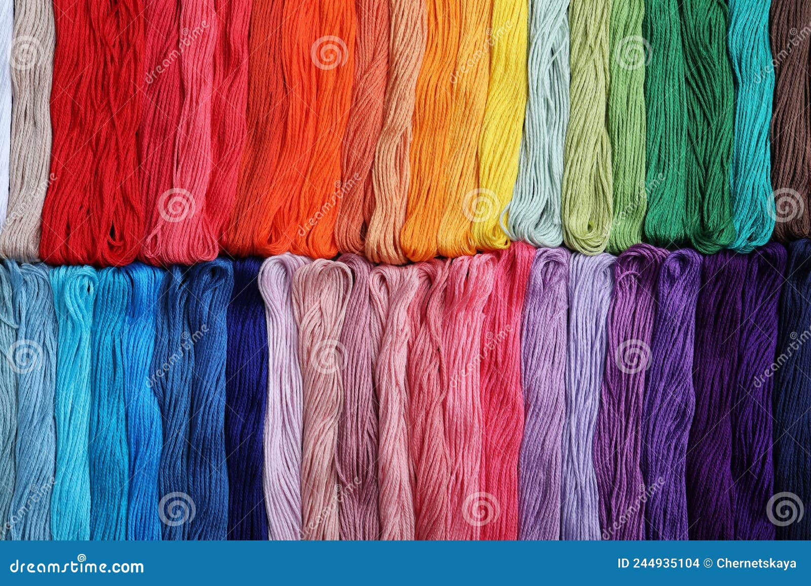 Different Colorful Embroidery Threads As Background, Top View Stock