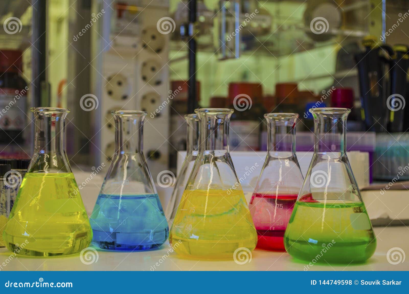 Different Colorful Solution In Conical Flask In A Chemistry Lab With Blur Background Organic Chemistry Experiment Photography Stock Photo Image Of Colorful Backdrop 144749598