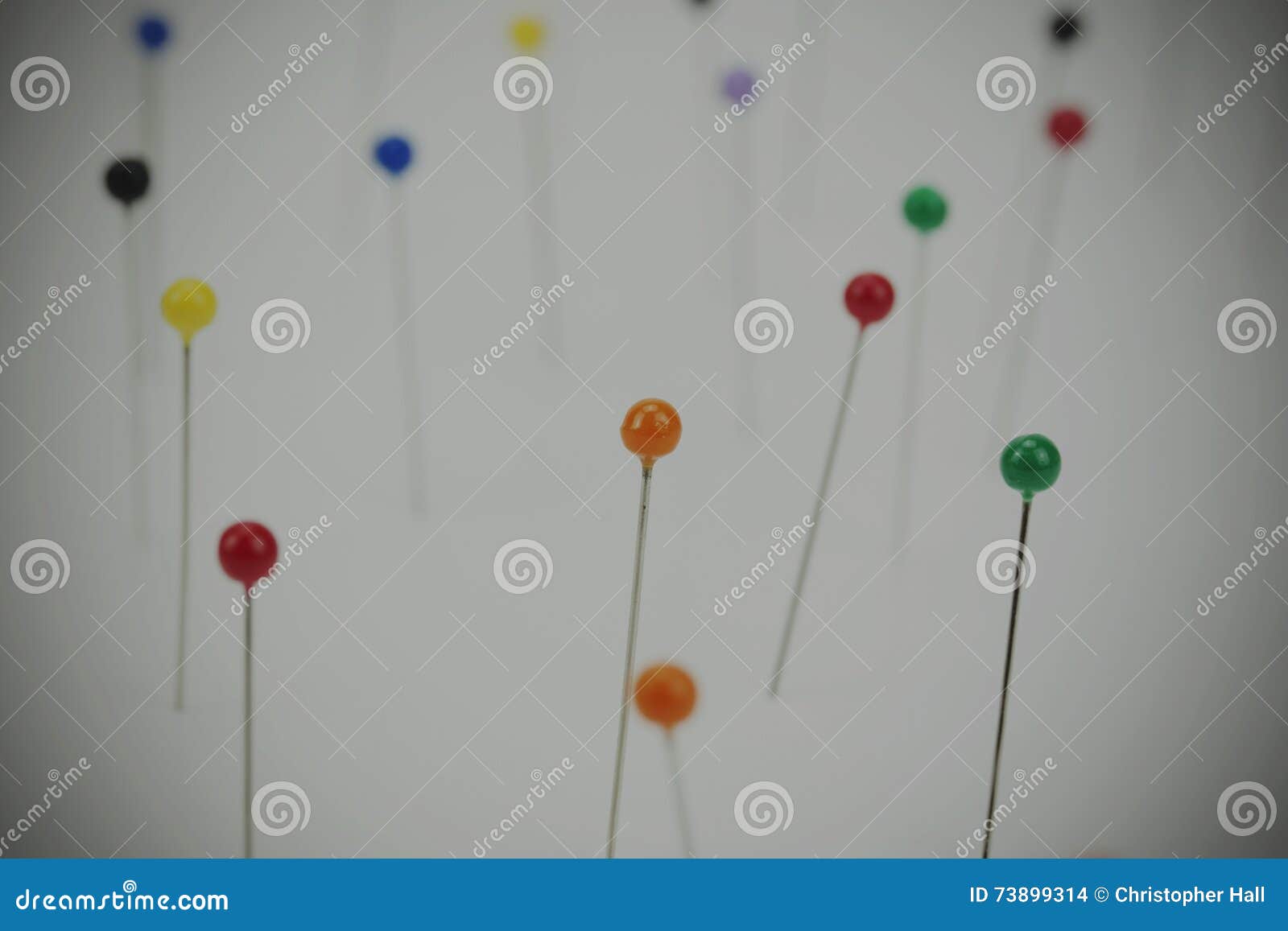 Different Coloured Pins on a Light Background Stock Photo - Image of ...