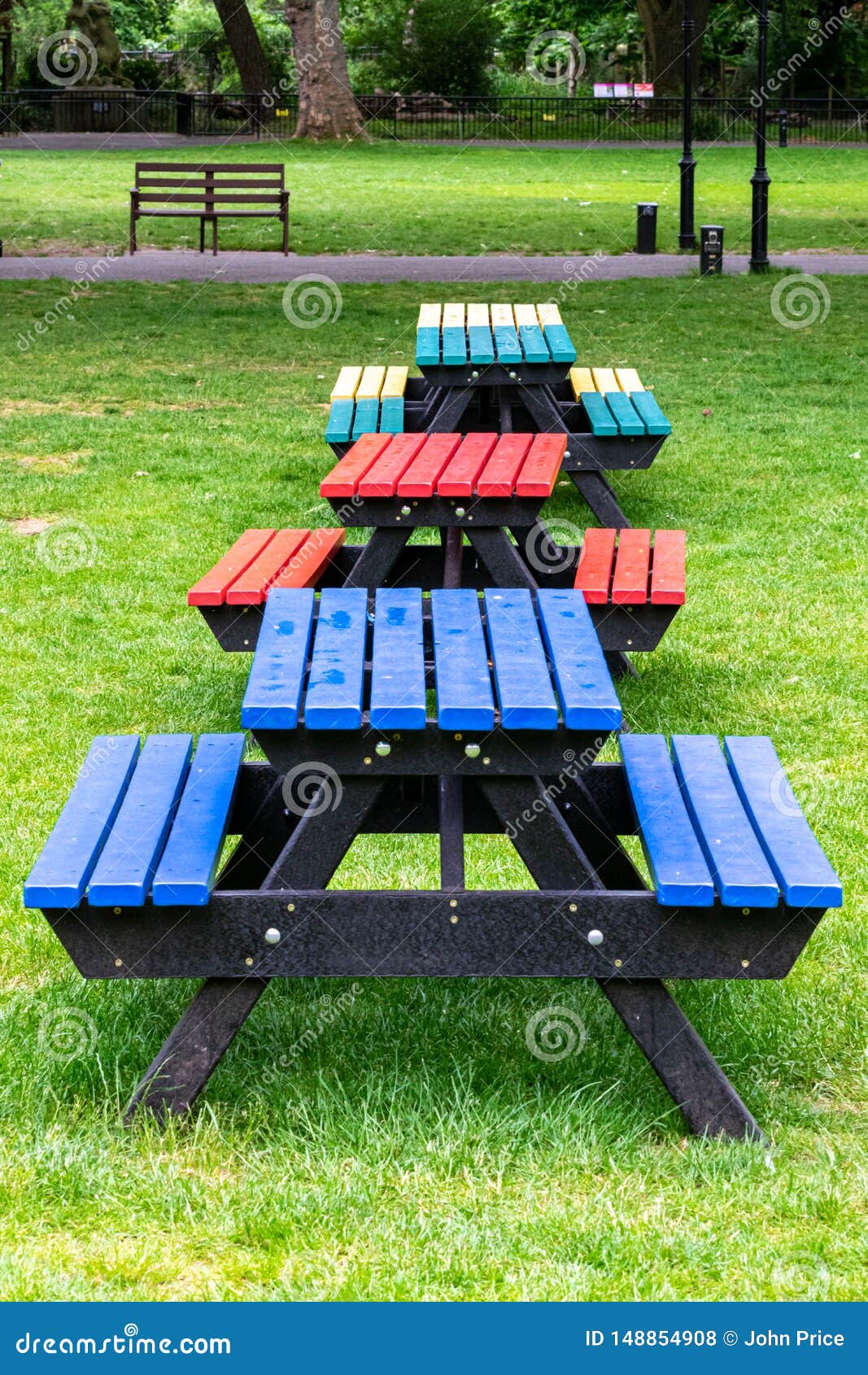 Different Coloured Tables and Seats in a Park Stock Photo Image of