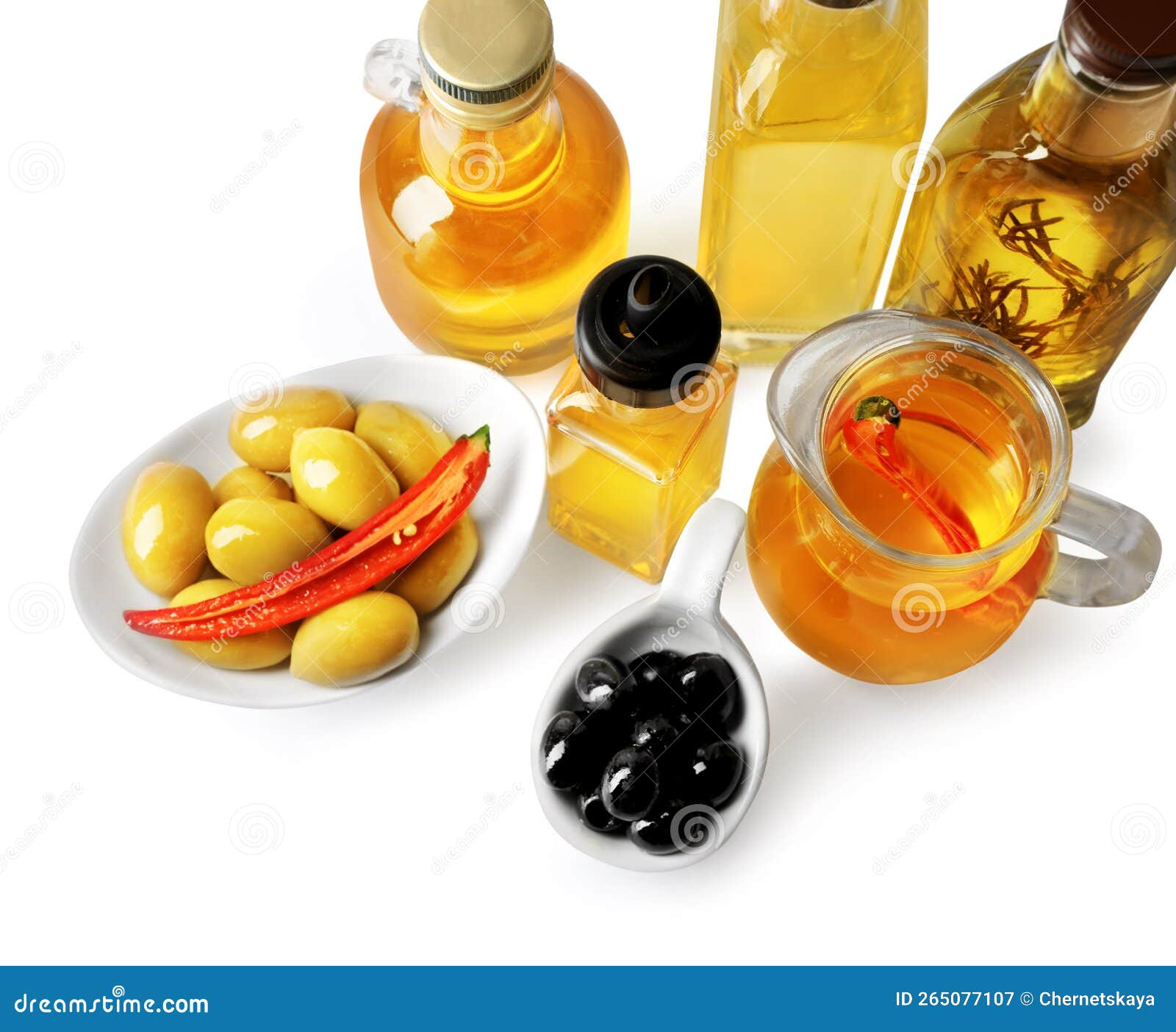 Different Cooking Oils and Olives on White Background, Above View Stock
