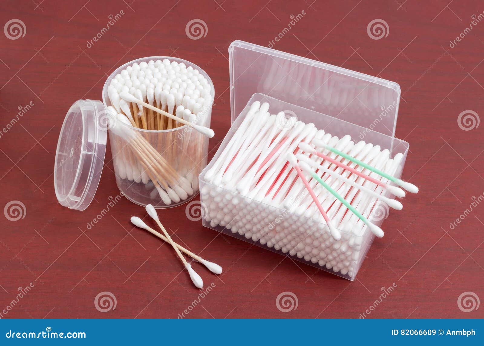 Different Cotton Swabs in Rectangular and Round Plastic Containers