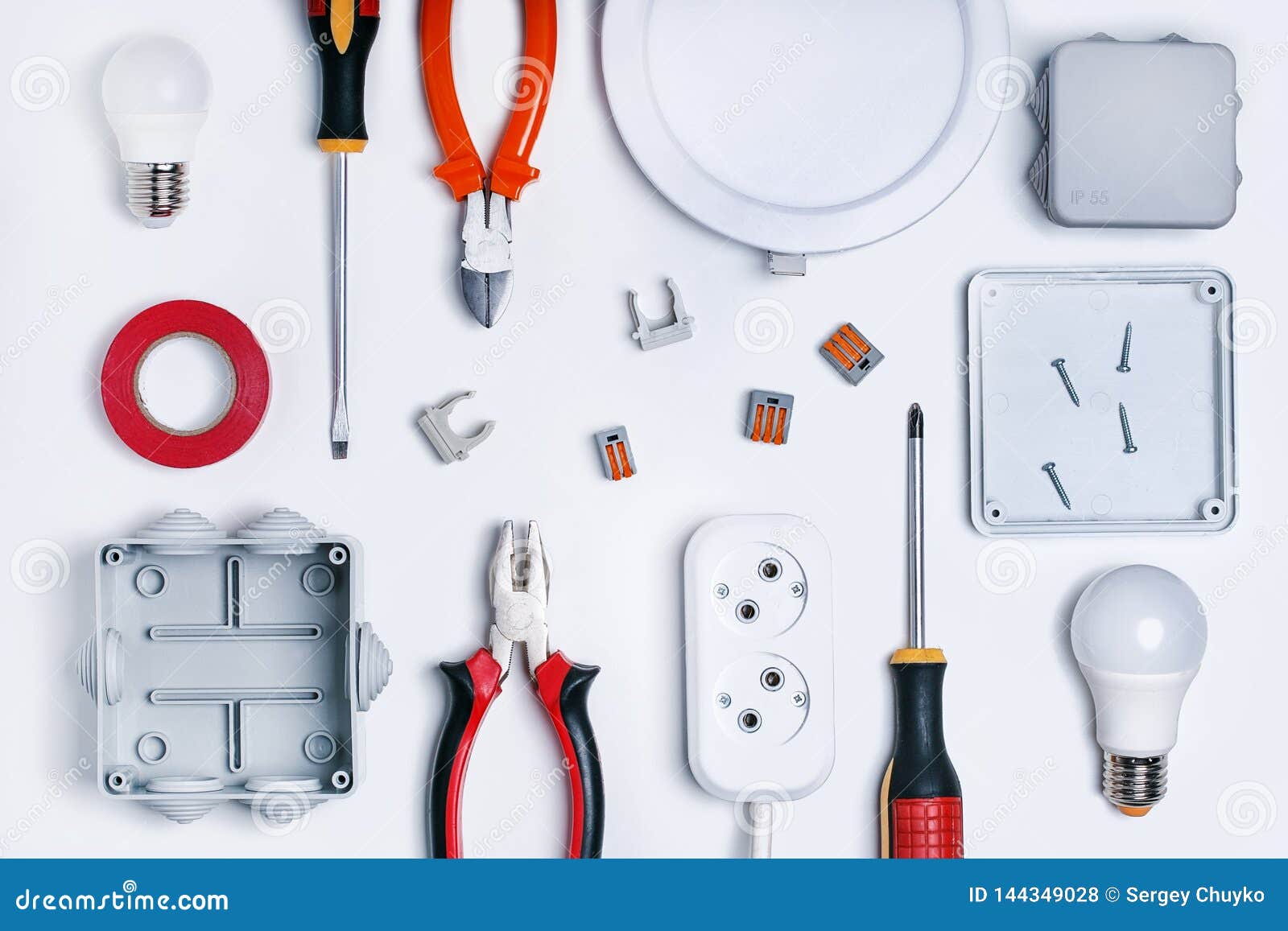 Different Electrical Tools on Light Grey Background, Top View. Stock