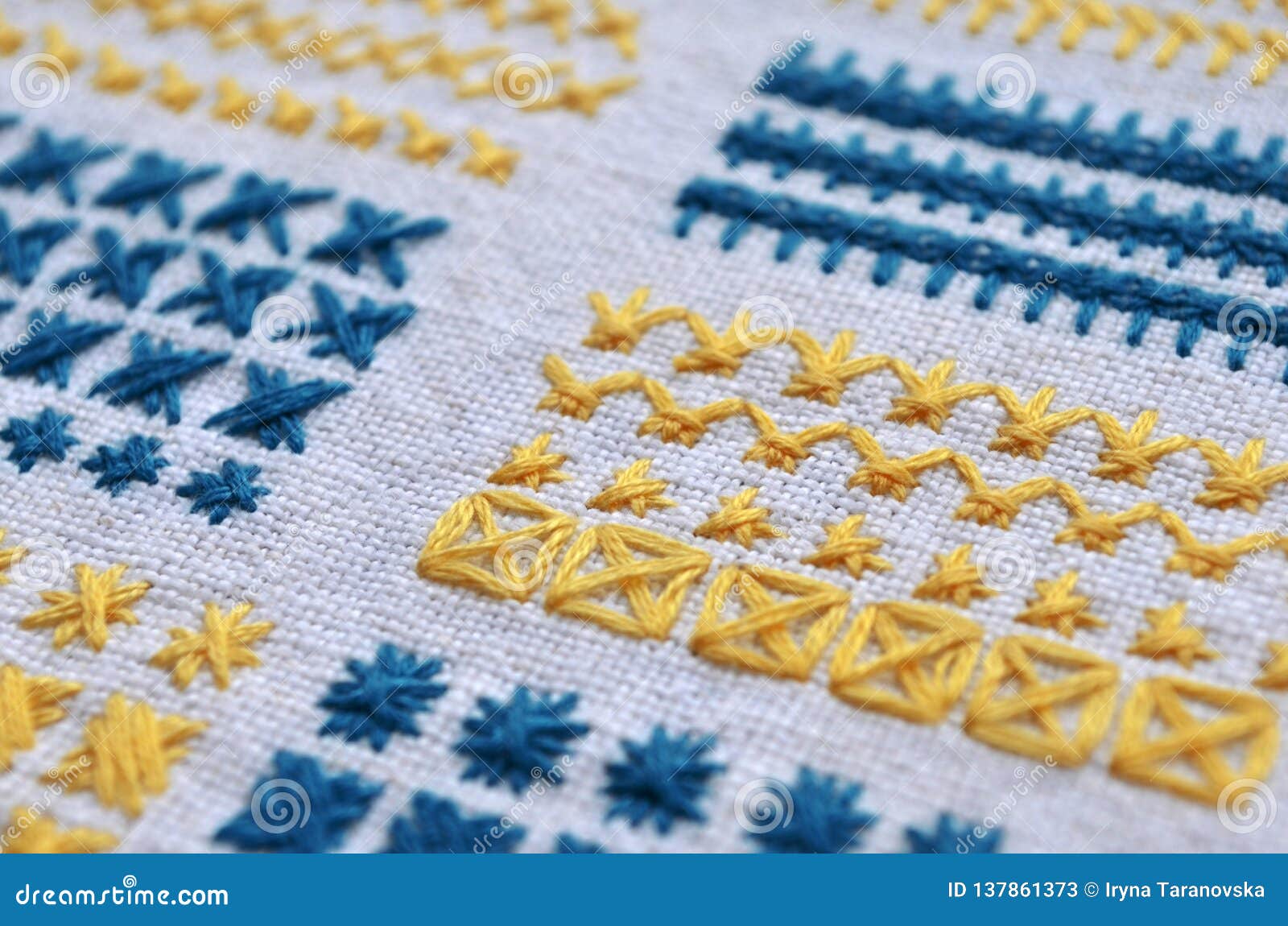Different Examples of Blue and Yellow Square Patterns of Embroidery on