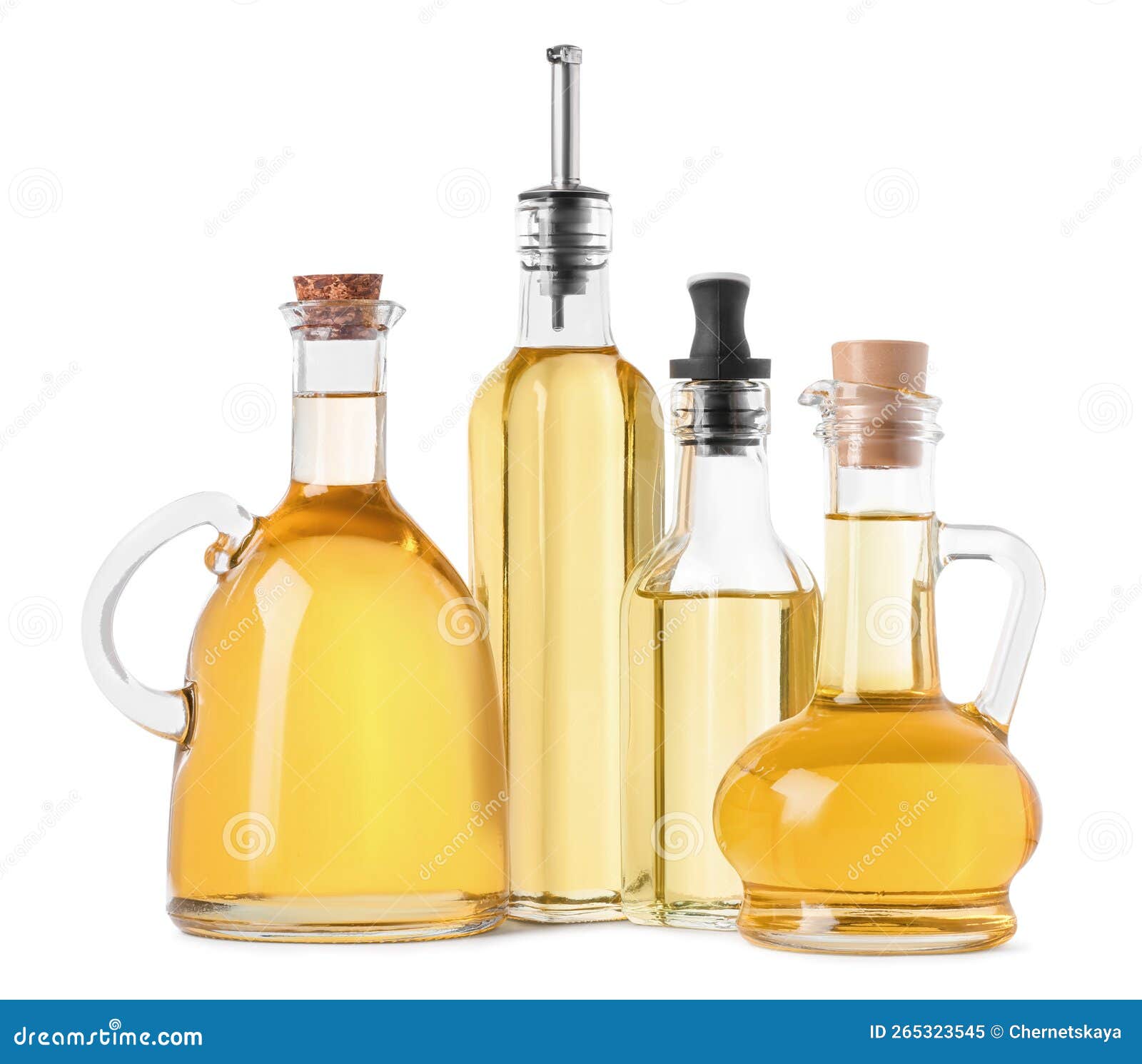 Different Glass Bottles of Cooking Oil on White Background Stock Image