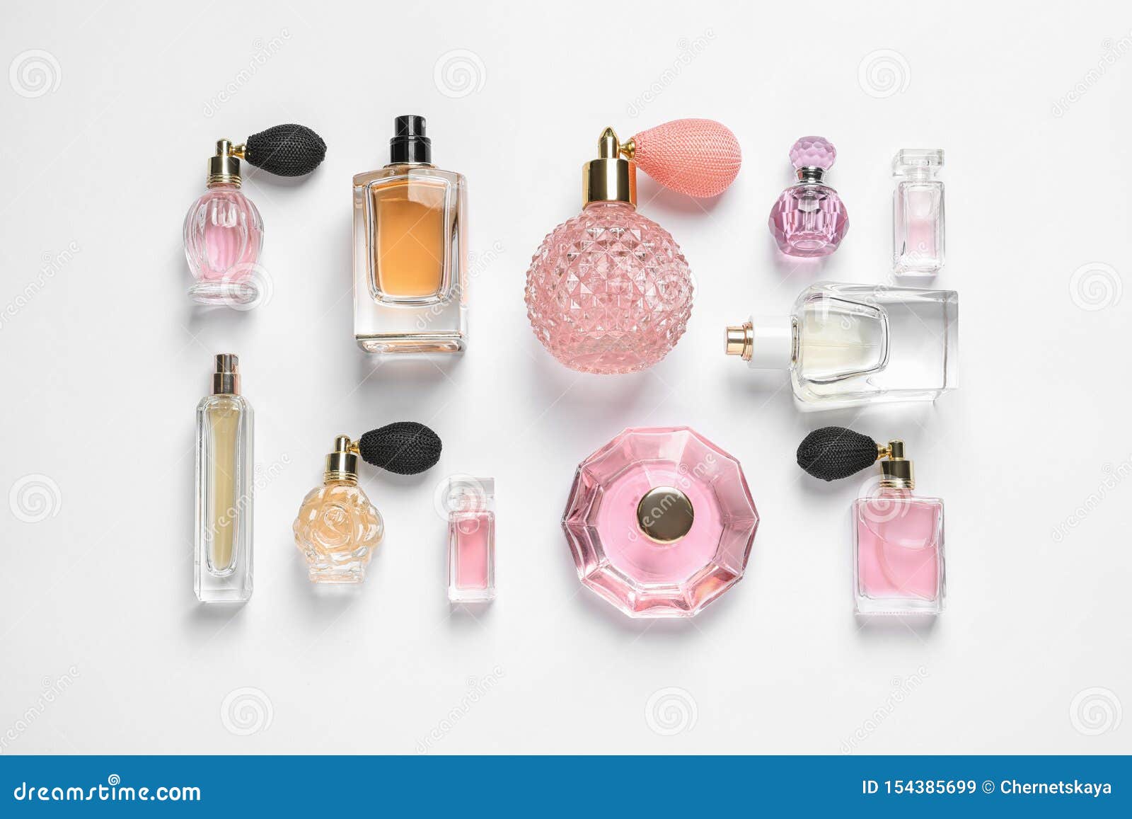 Different Luxury Perfume Bottles on White , Top View Stock Image