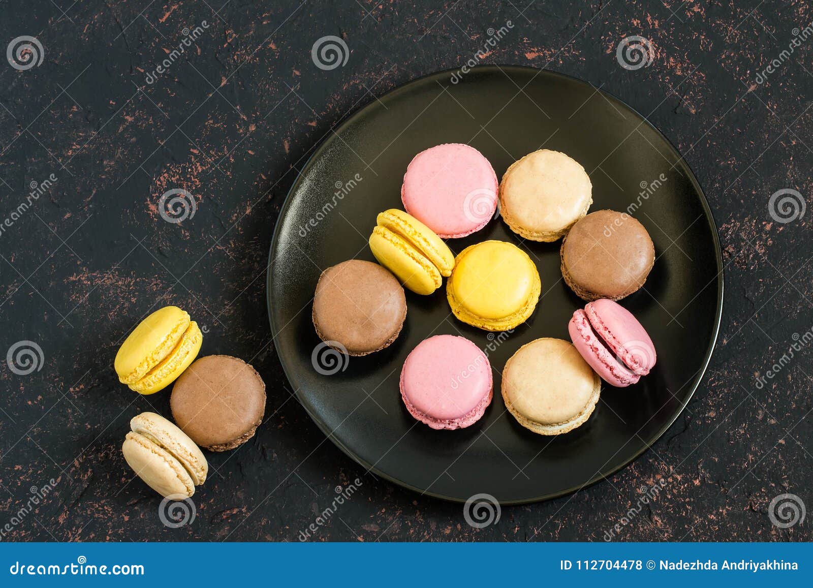 Different Macaroon on Black Plate Stock Photo - Image of delicate ...