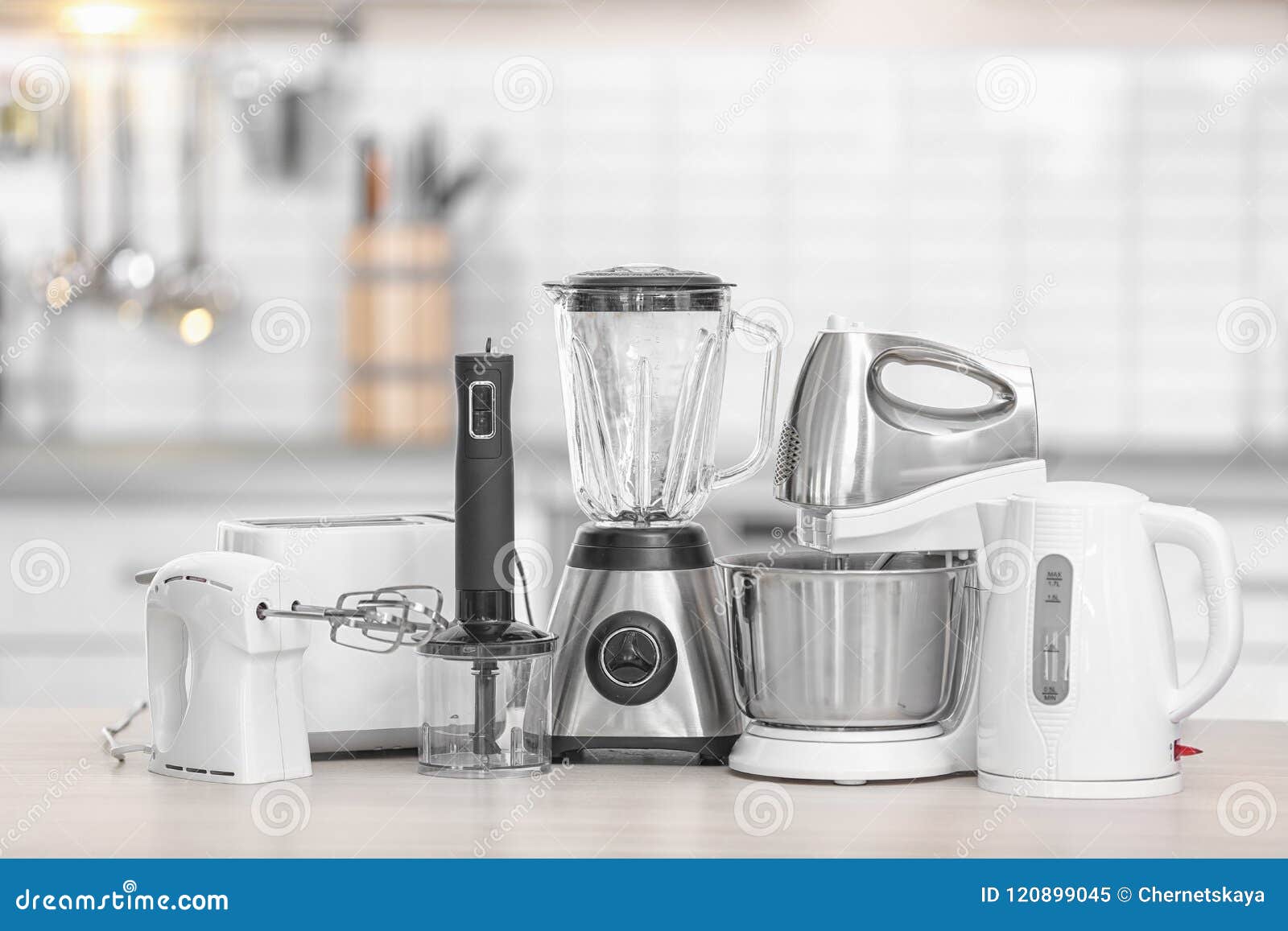 Different Modern Kitchen Appliances on Table Indoors. Interior Element