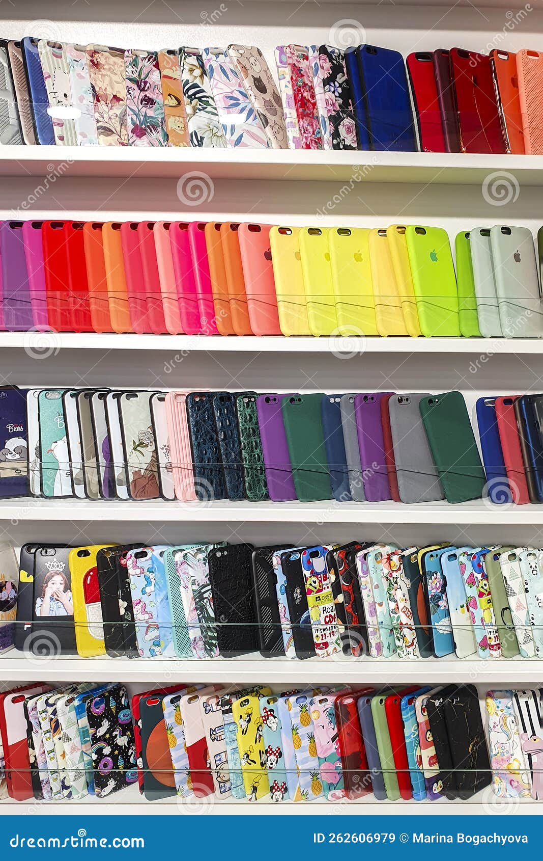 Different Multicolored Phone Cases on Store Shelf Editorial Stock