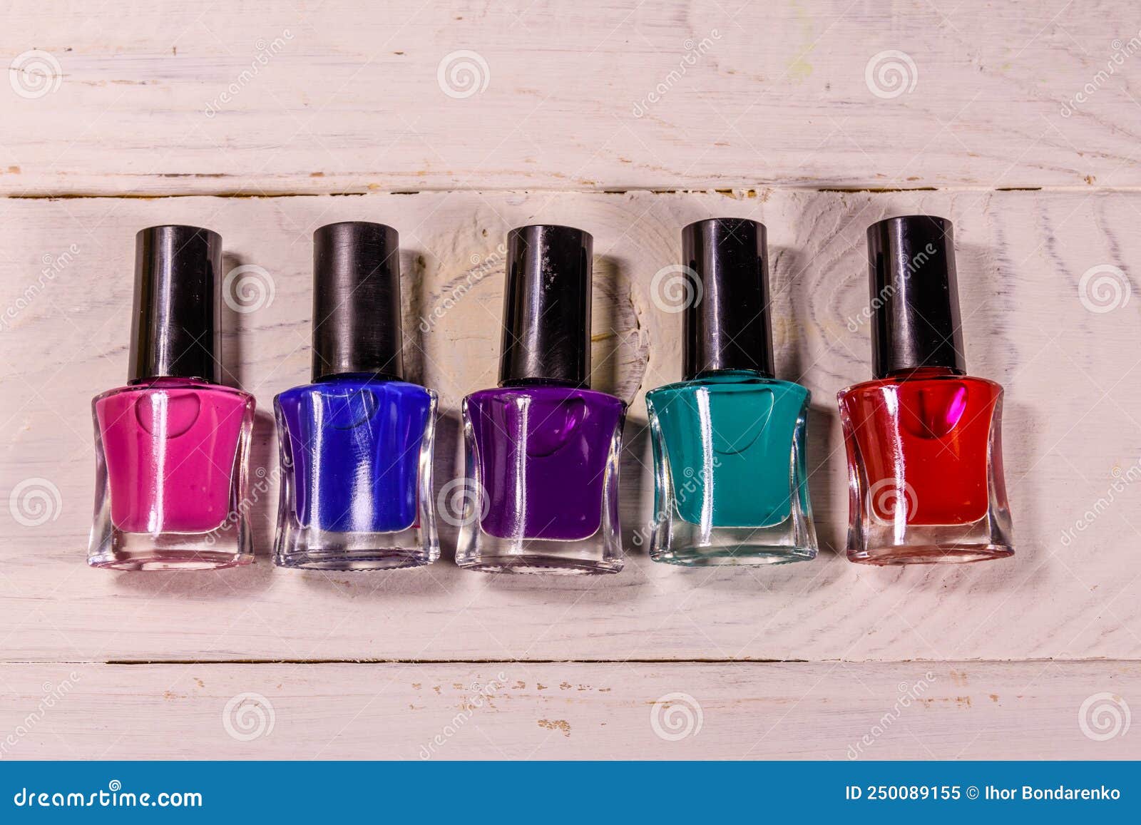 Different Nail Polishes on a Wooden Table. Top View Stock Image Image