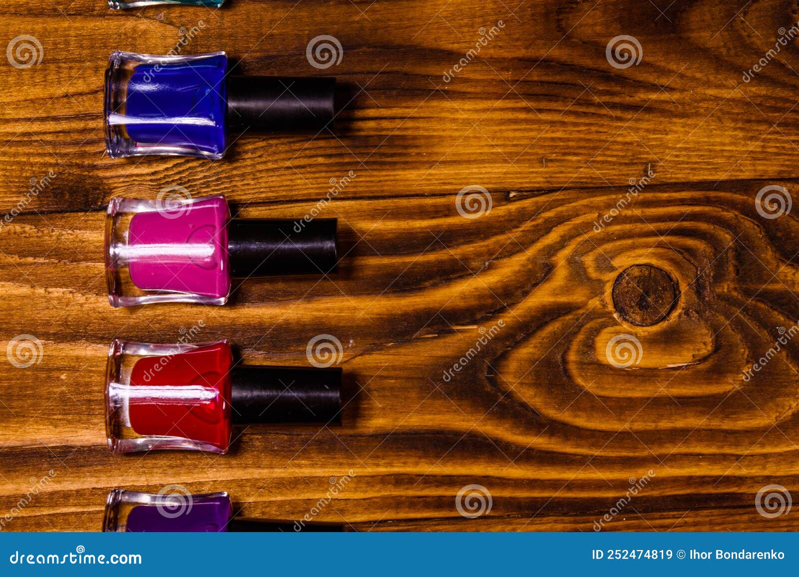 Different Nail Polishes on a Wooden Table. Top View Stock Image Image