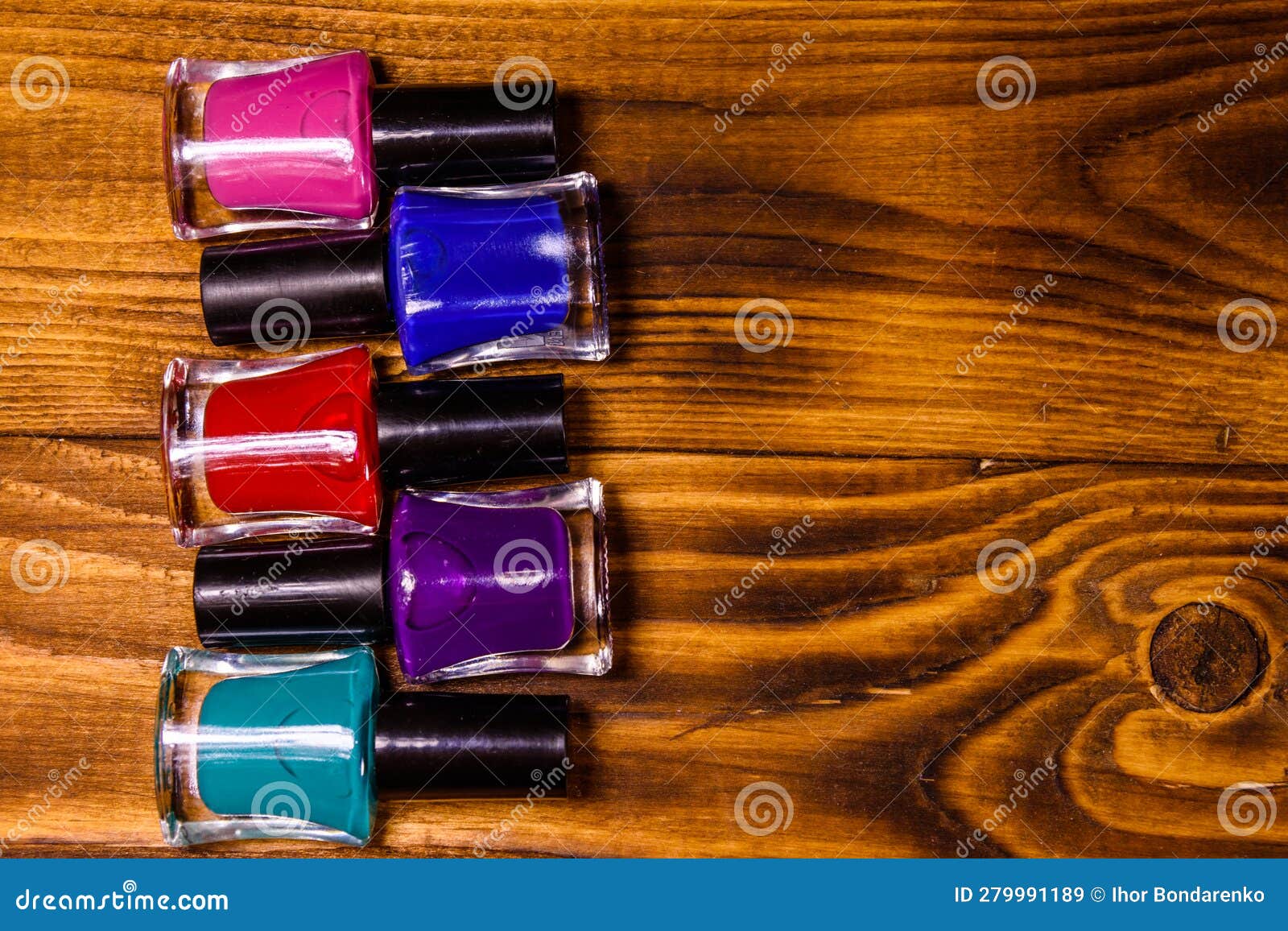 Different Nail Polishes on a Wooden Table. Top View Stock Image Image