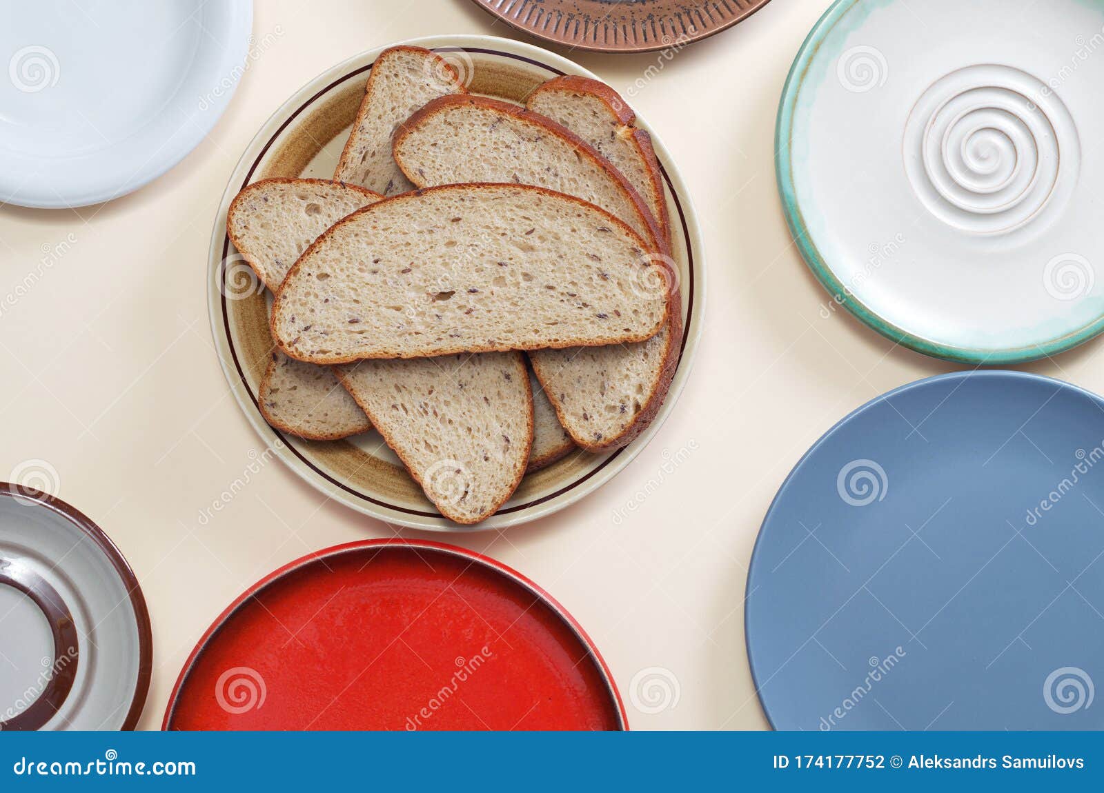 Different plates and bread stock photo. Image of gray 174177752