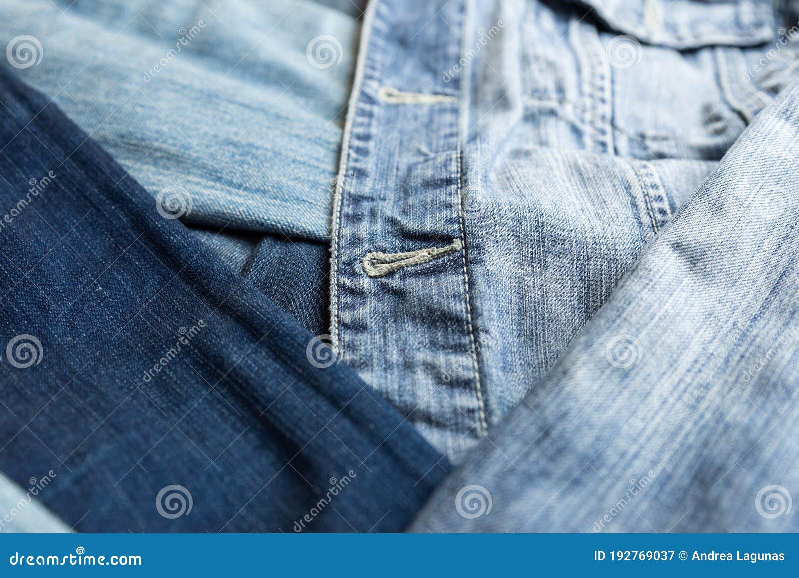 Flat lay of classic blue jeans. Urban outfit, basic essencial wardrobe,  shopping concept. Top view Stock Photo by OksaLy