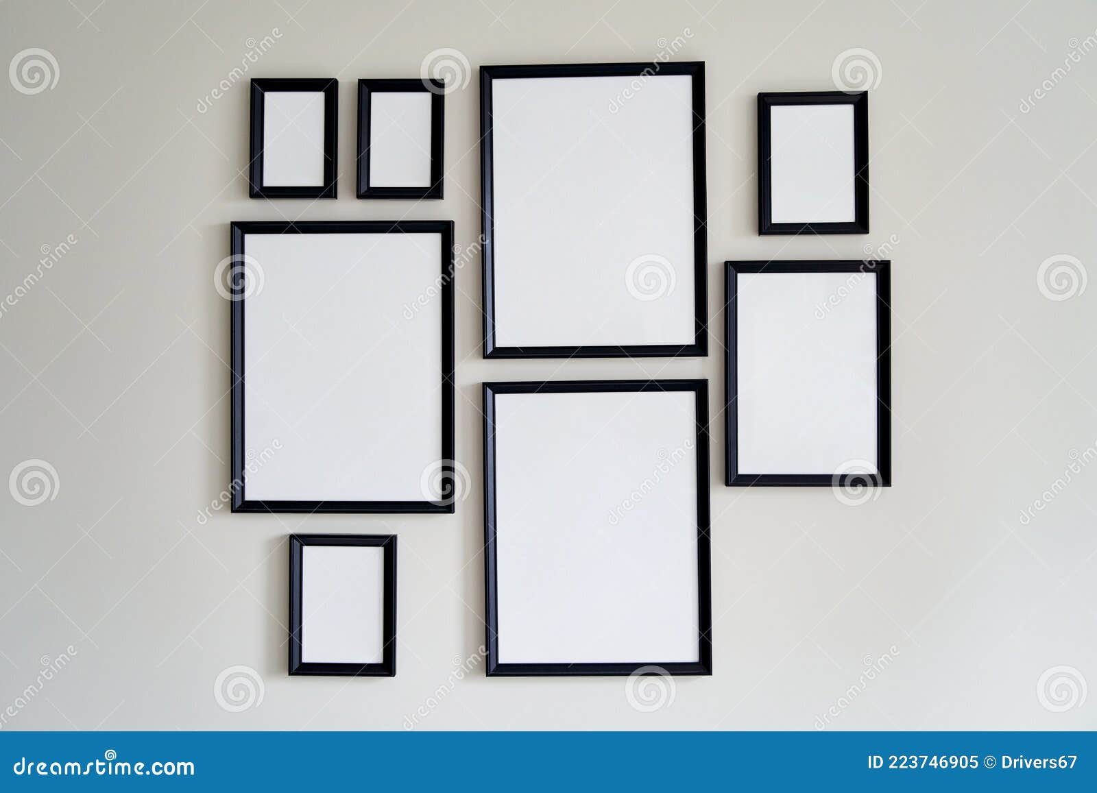 Different Size Framed Photos Hanging on the Gray Wall. Mockup. Stock ...