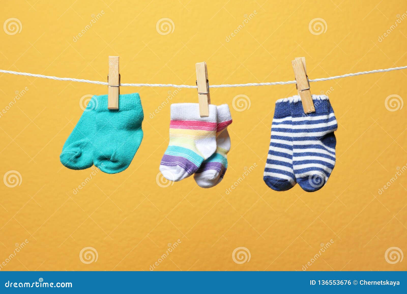 Different Socks for Baby on Laundry Line Stock Photo Image of color