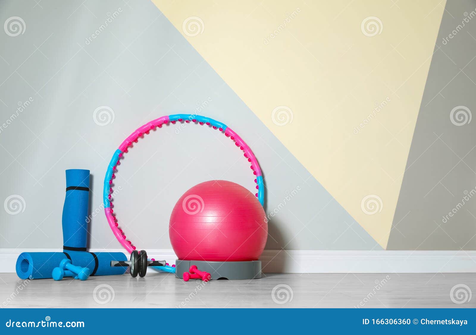 Different Sports Equipment Near Wall In Gym. Space For Text Stock Photo - Image of orthopedist ...