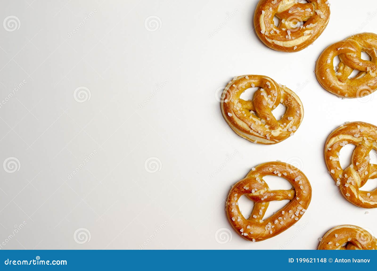 Different Tasty Homemade Pretzels on White Background Stock Photo