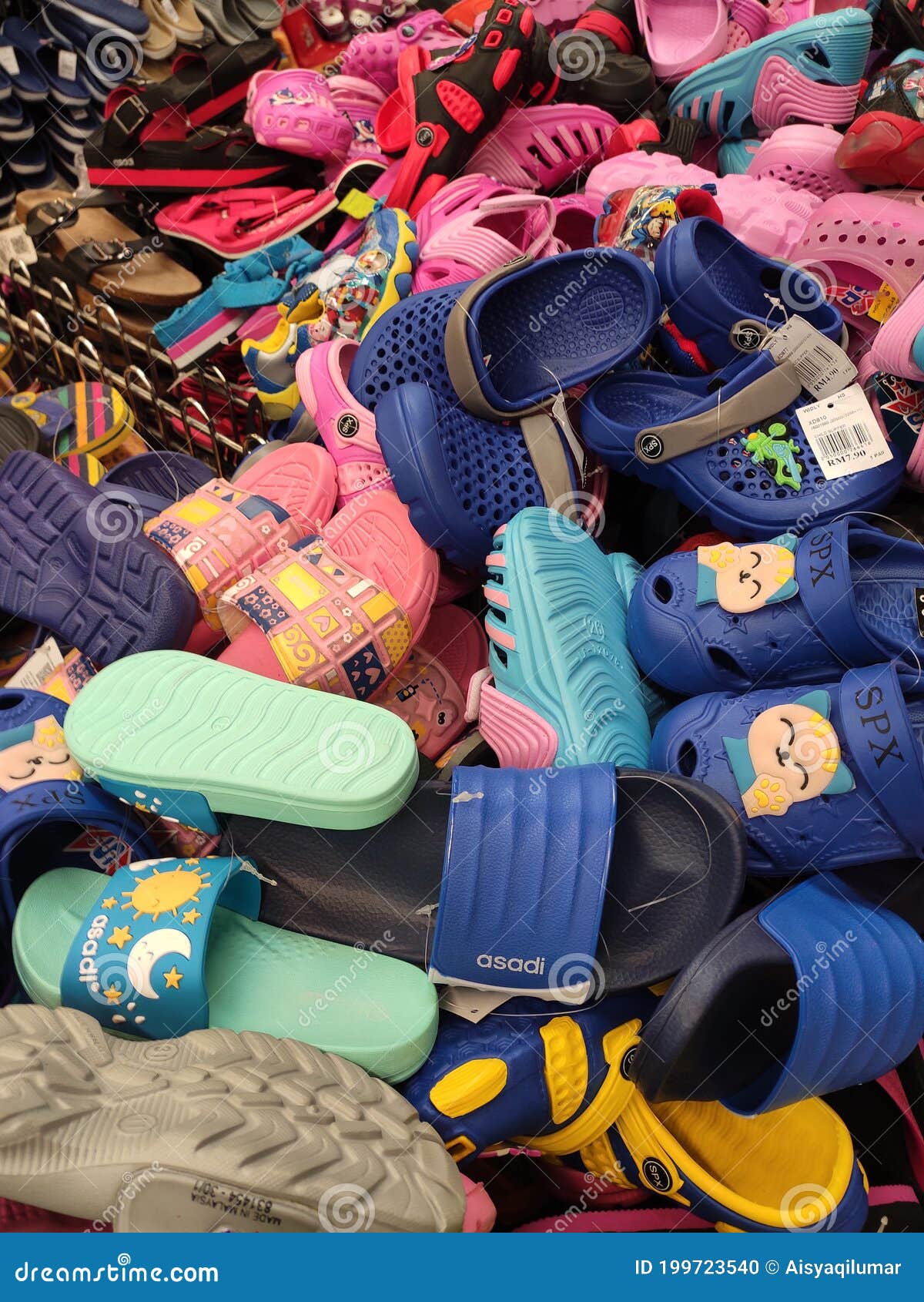 Different Type of Shoes and Slippers Piled Up in One Place and Sell ...