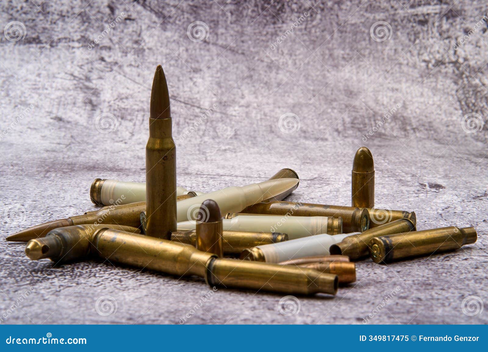 different types of ammunition scattered on the ground.