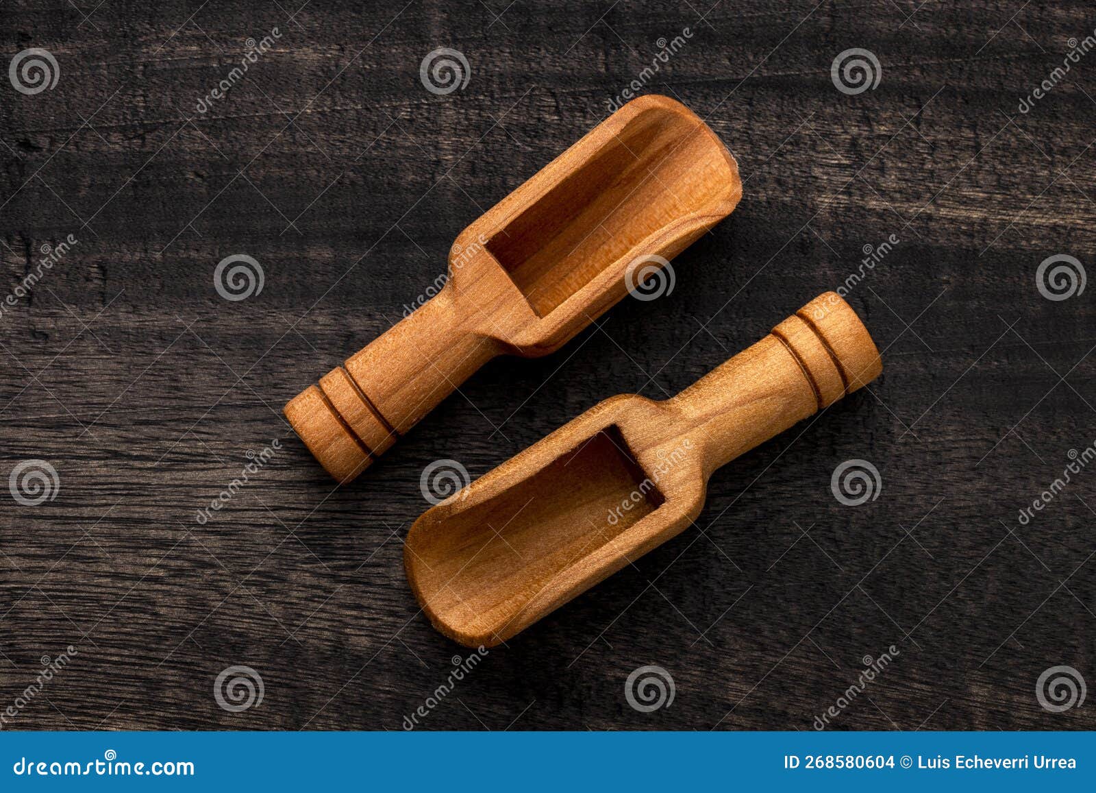 Different Types of Wooden Scoop on Dark Rustic Table Kitchen