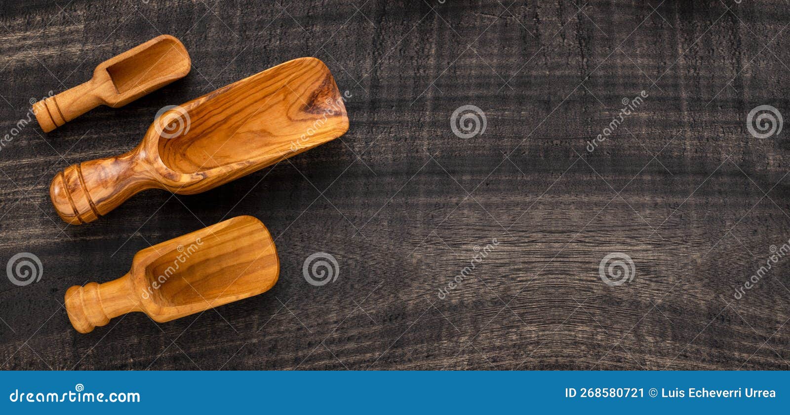 Different Types of Wooden Scoop on Dark Rustic Table Kitchen