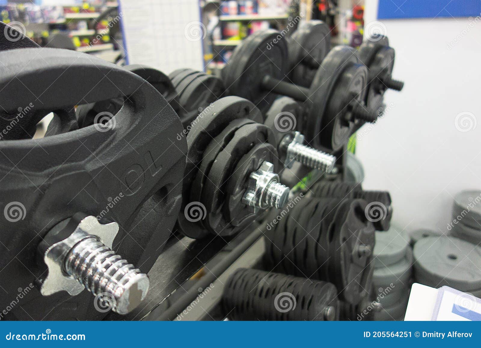 Different Weights from the Bar and Dumbbells in the Sports Store. Sports Concept Stock Image Image of activity branding 205564251