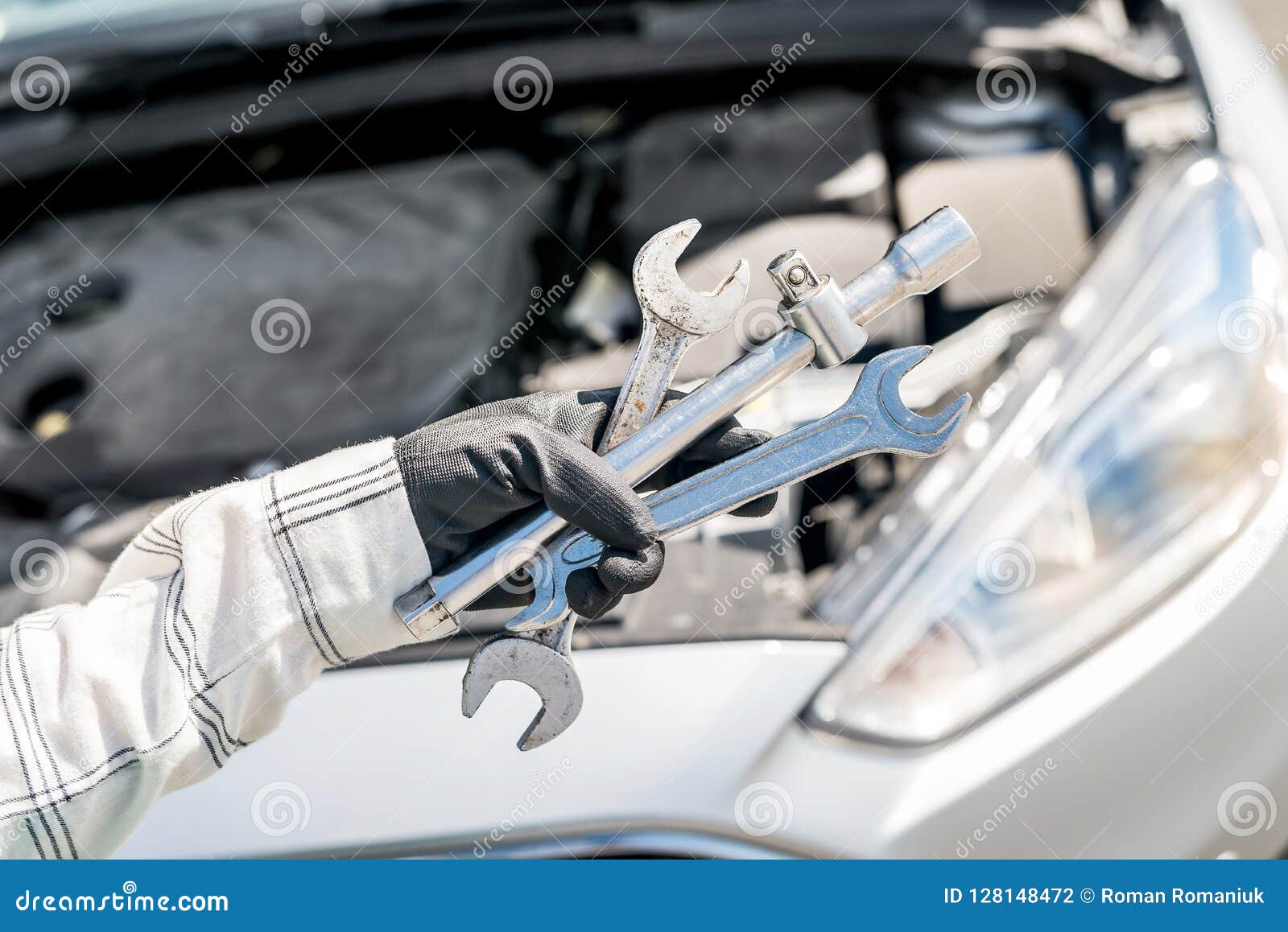 Different Wrenches and Spanners in Hand Over Car Stock Photo Image of