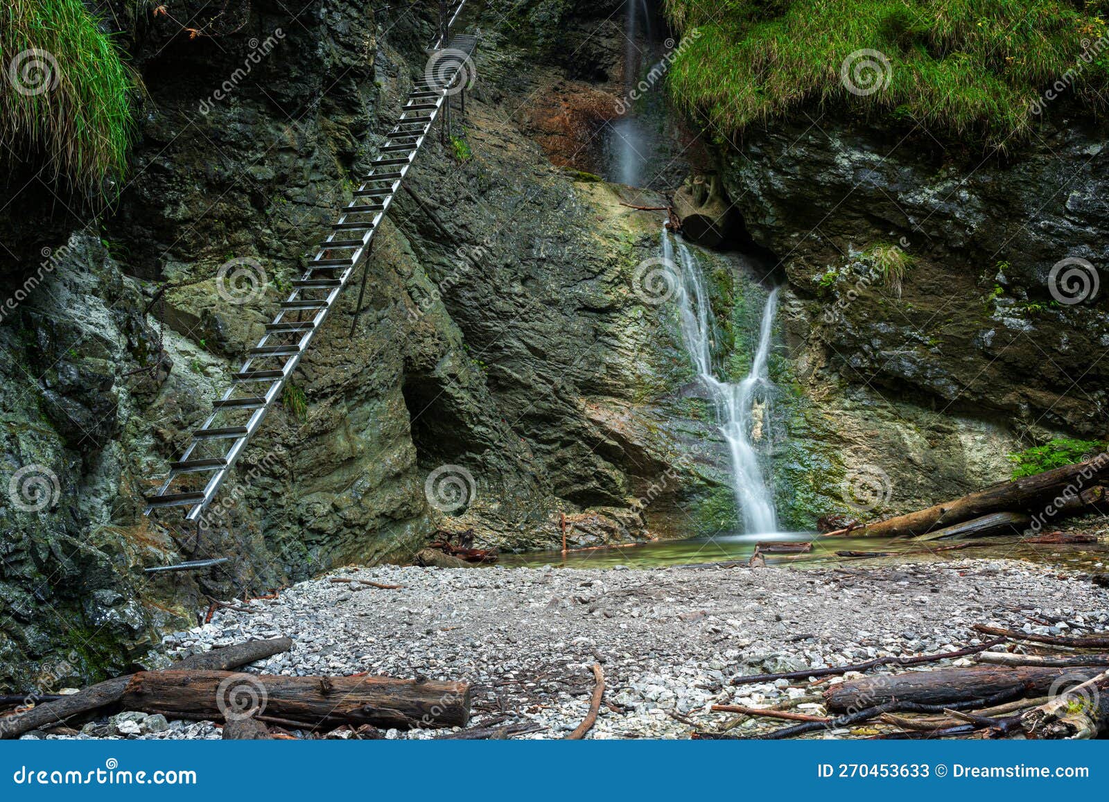 difficul trail with ladder near the waterfall in canyon of national park slovak paradise