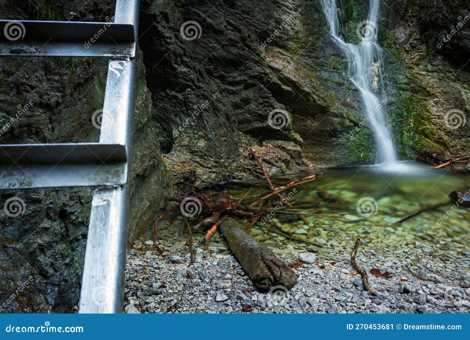 difficul trail with ladder near the waterfall in canyon of national park slovak paradise