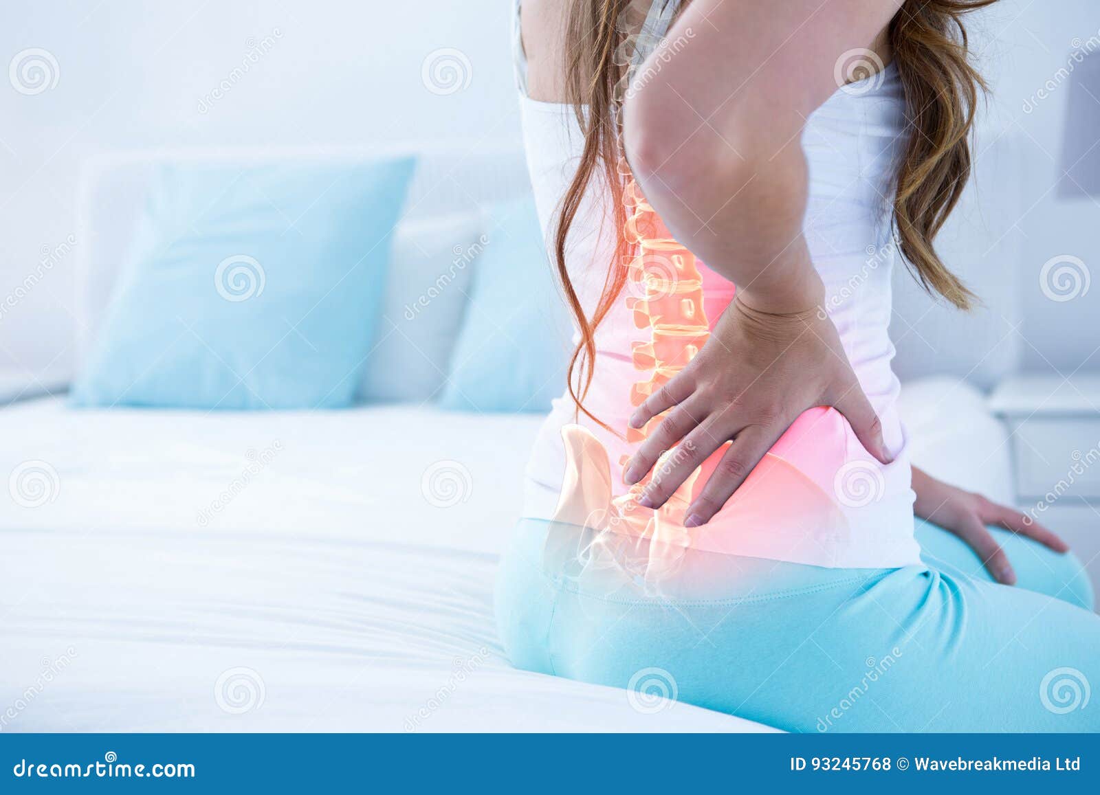 digital composite of highlighted spine of woman with back pain