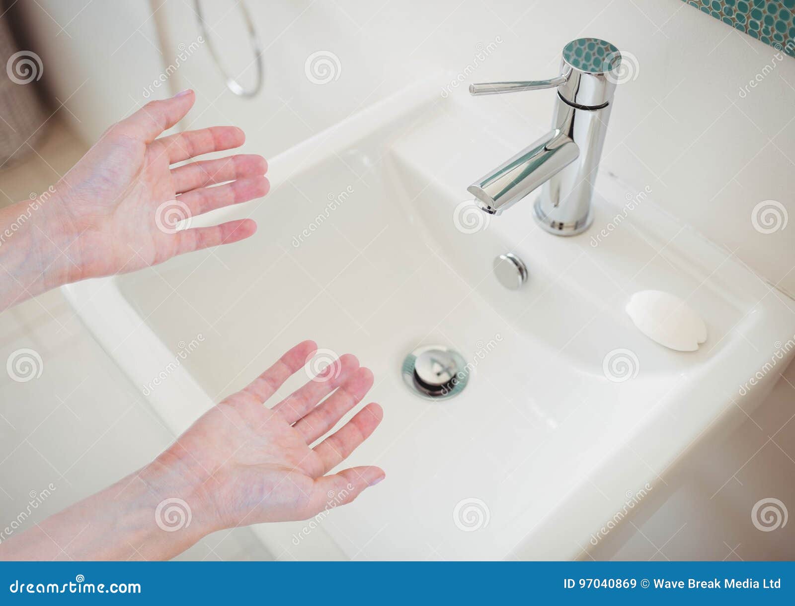 Washing hands in sink stock image. Image of household 97040869