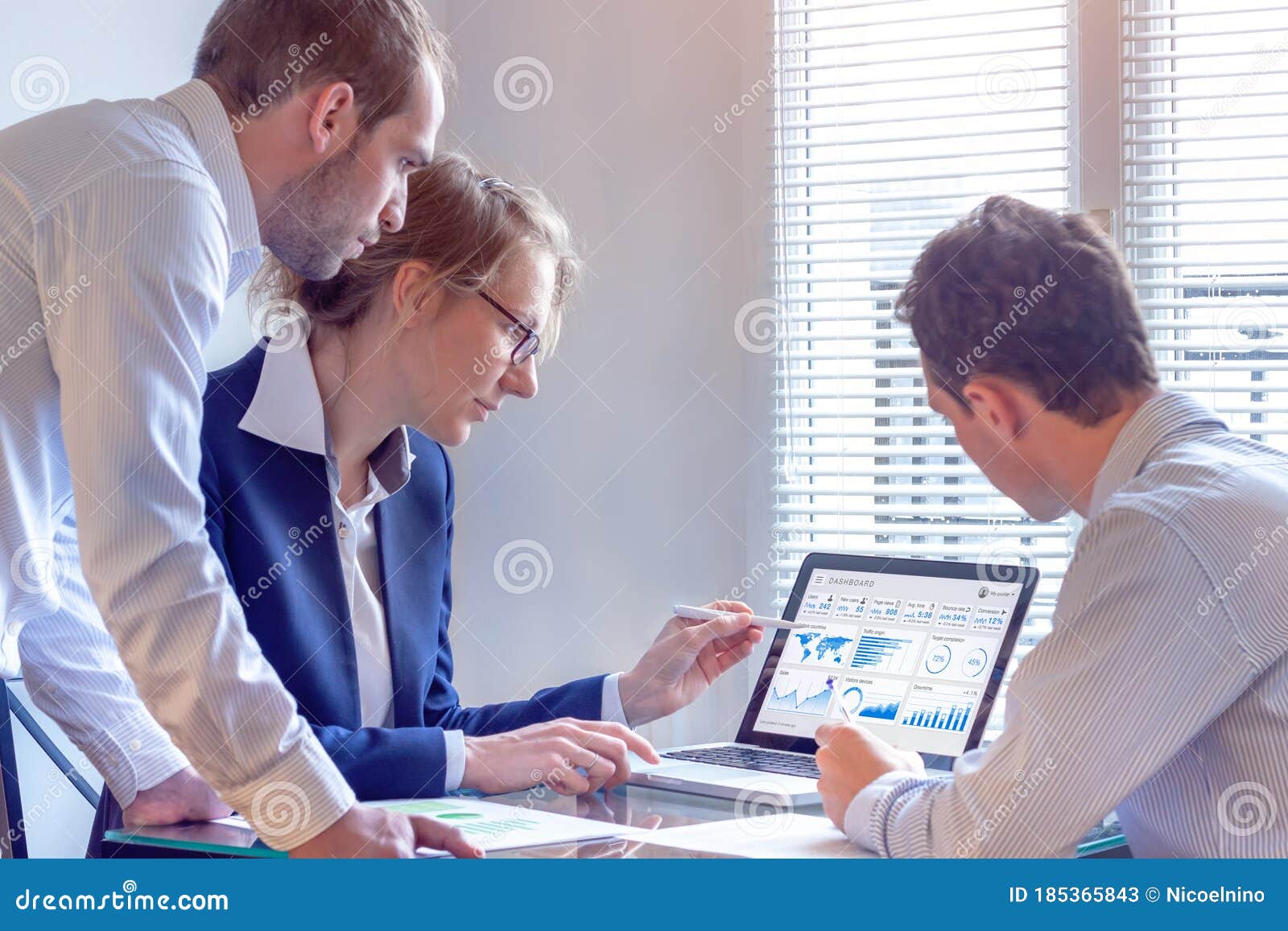 digital marketing analyst people working on internet advertisement campaign analytics data on key performance indicator dashboard