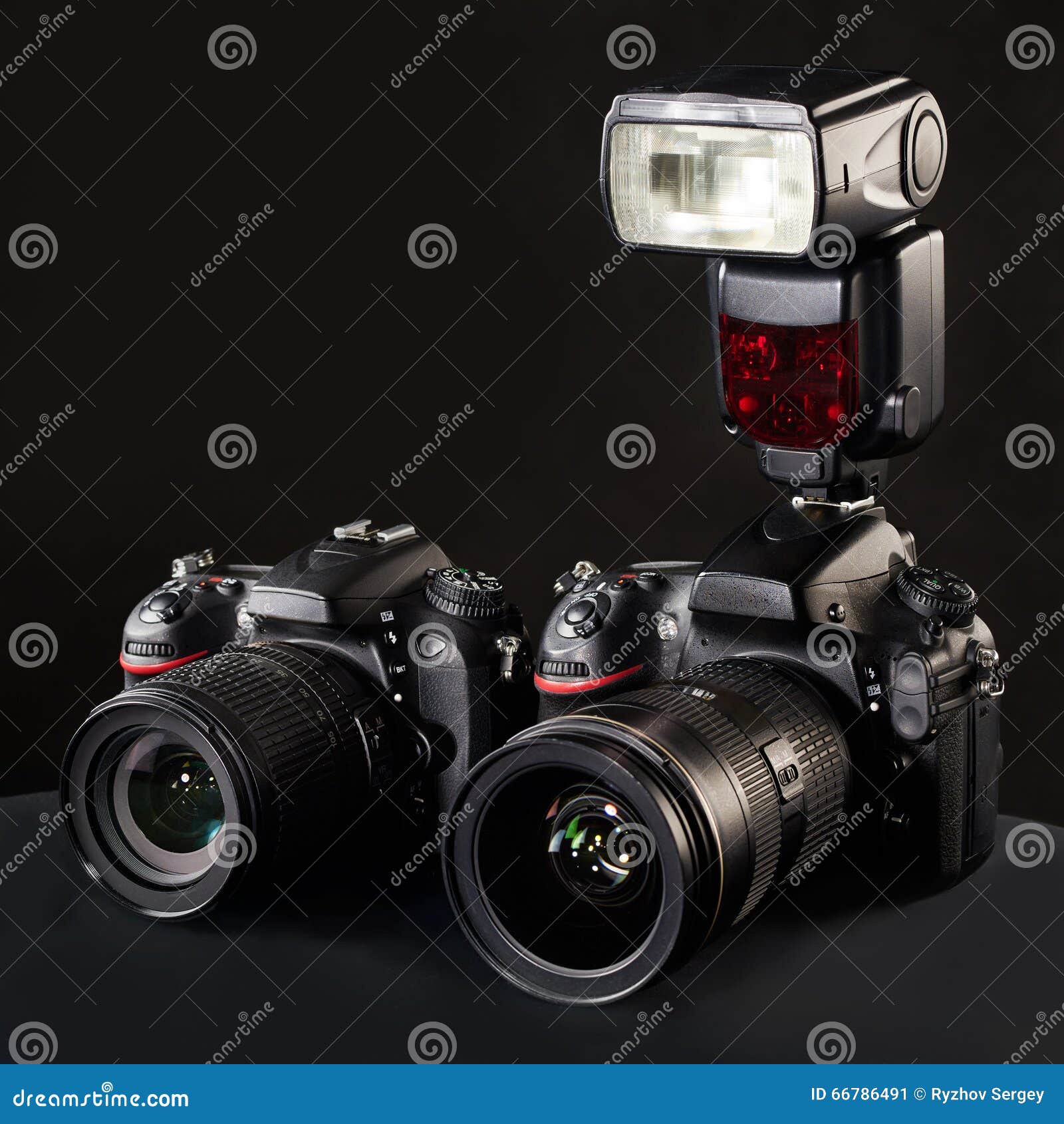 Digital SLR cameras, lens and flash on black. Set of photographs. DSLR cameras, lens and flash