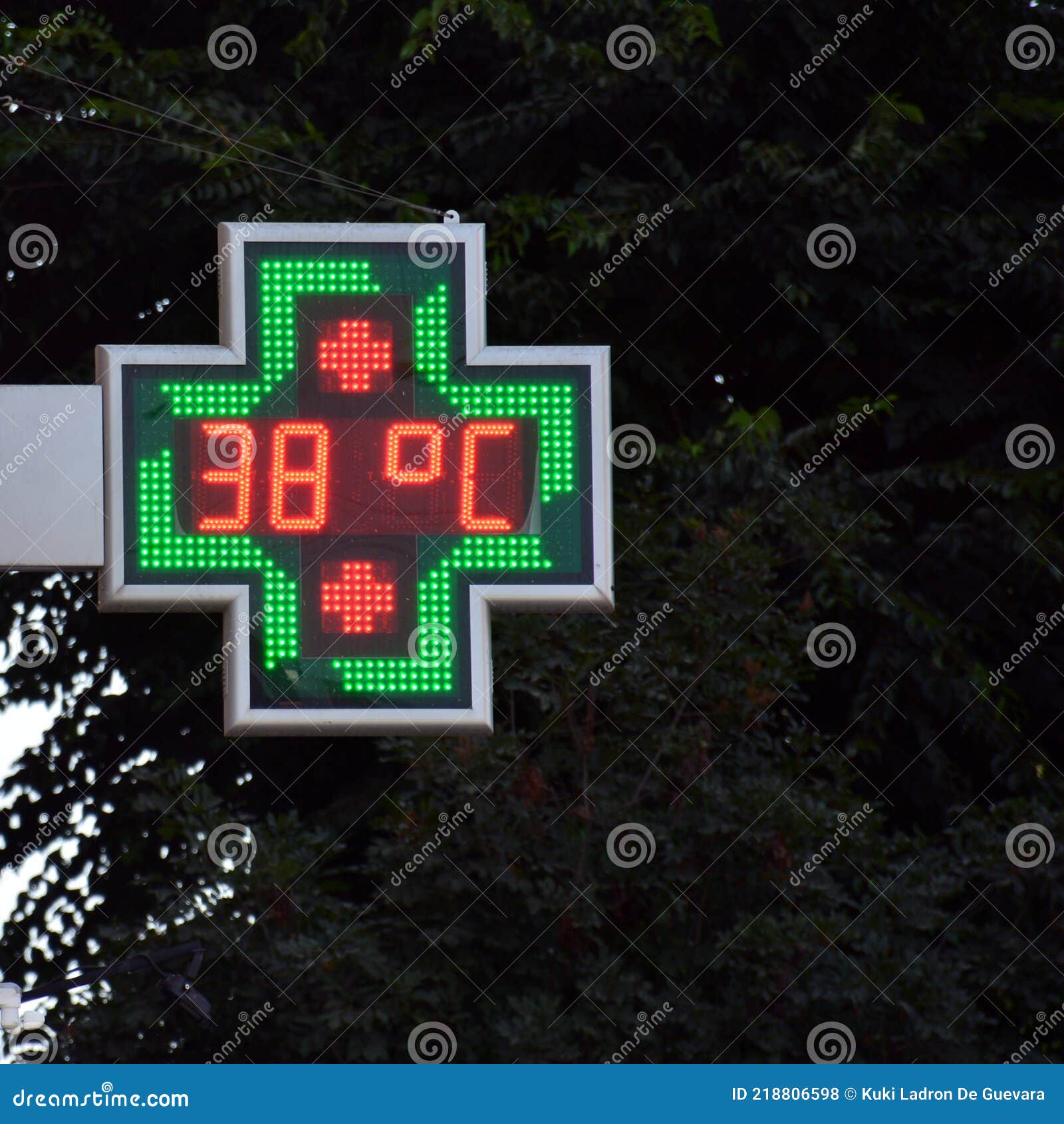 street thermometer marking 38 degrees