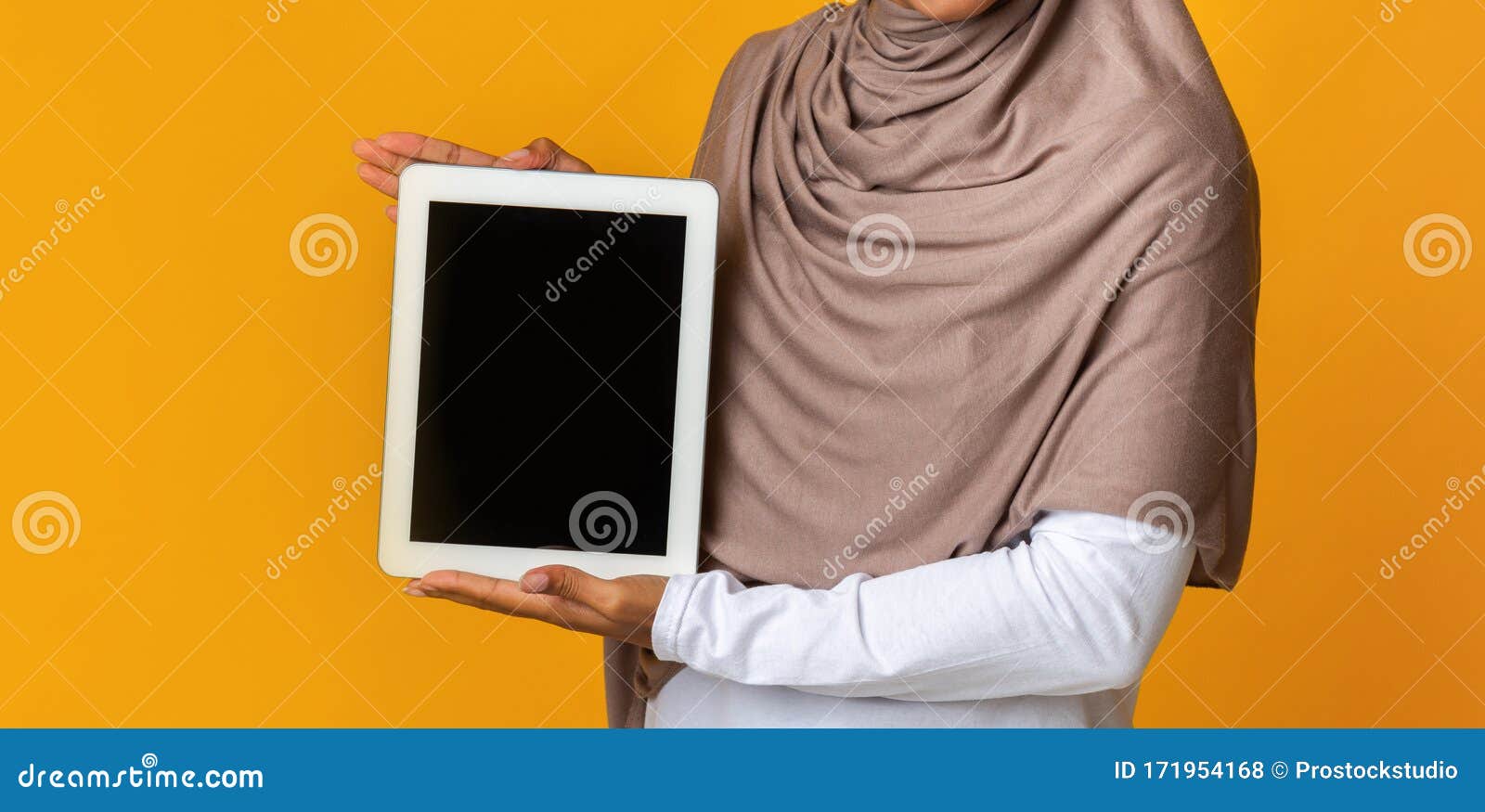 Download Unrecognizable Woman In Headscarf Holding Digital Tablet ...