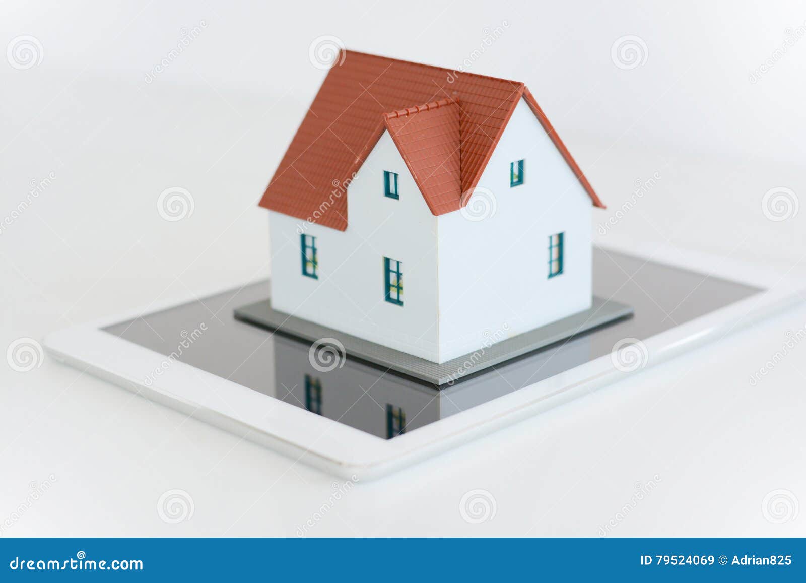 Digital Tablet and House Model on White Background Stock Image Image