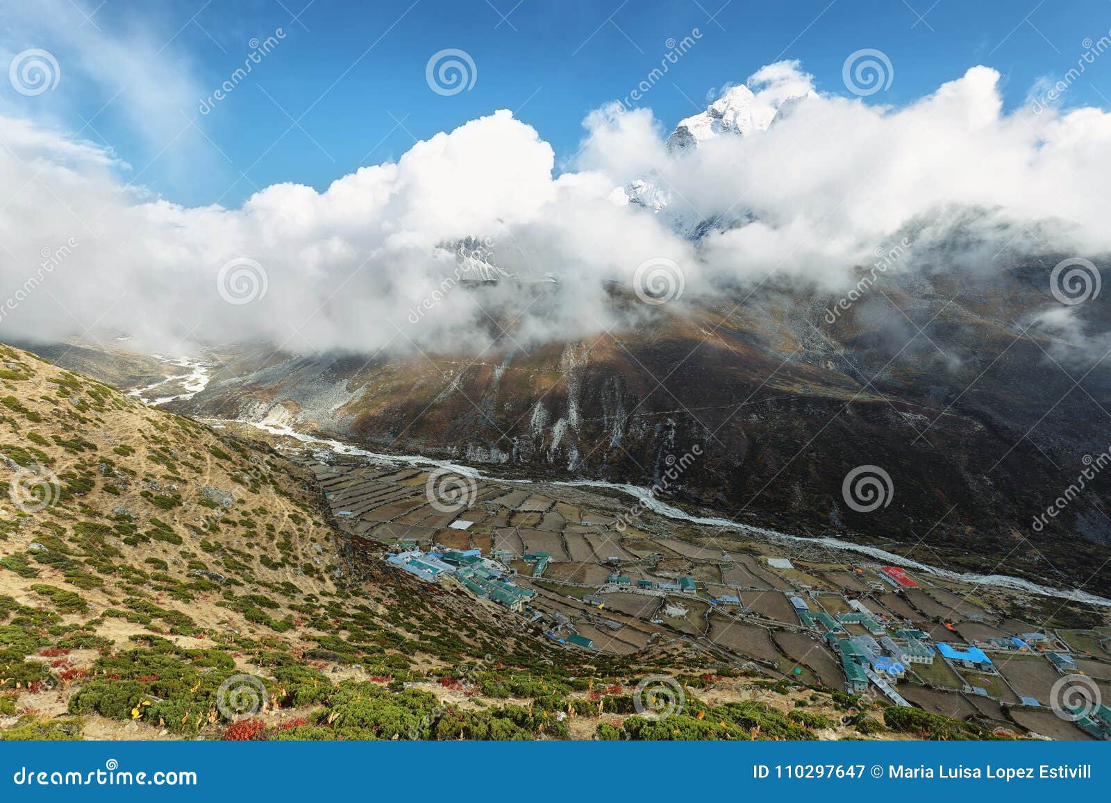 dingboche village with ama dablan peak behind between clouds