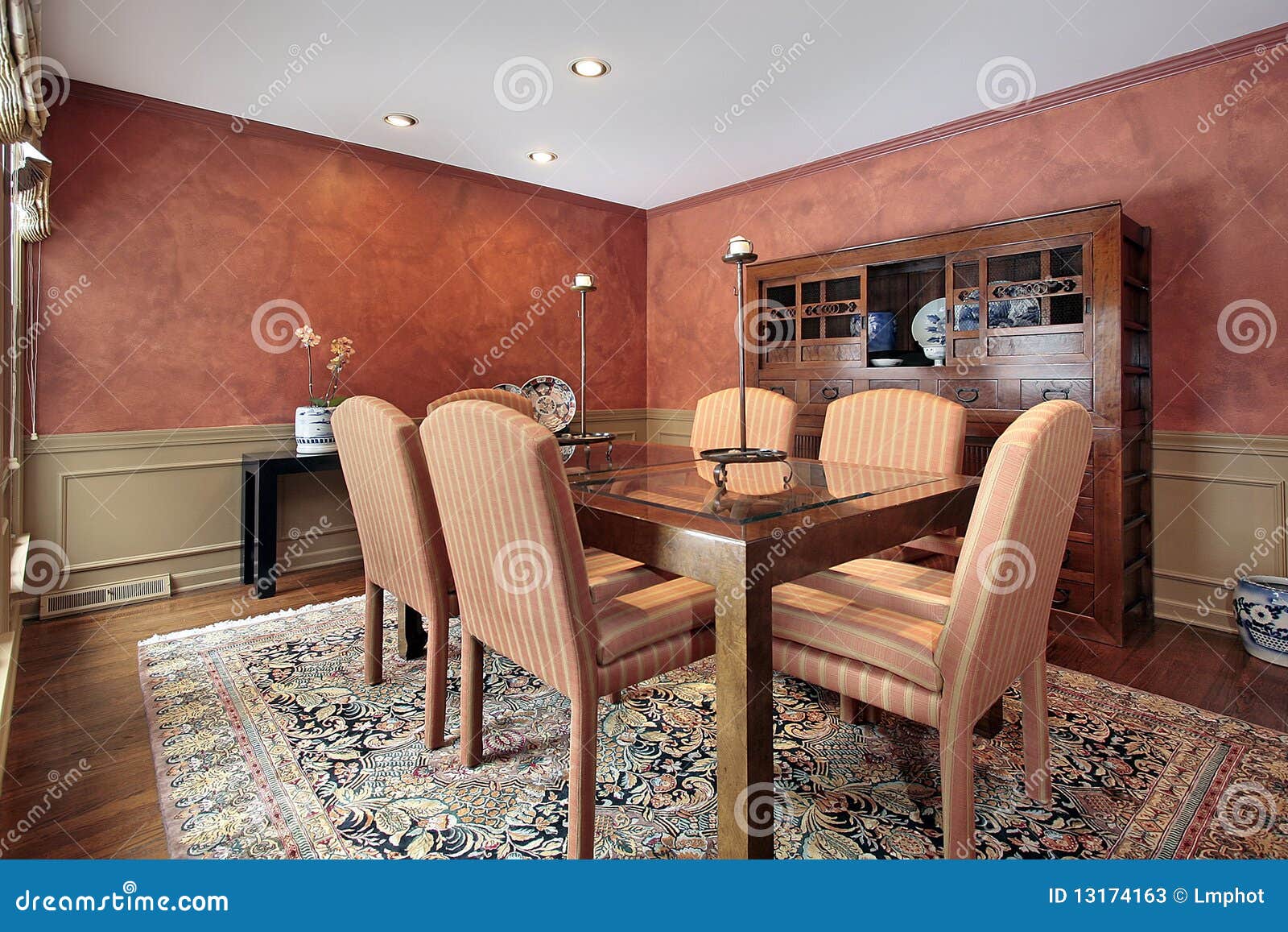 Dining Room with Orange Walls Stock Image Image of furnishings, room