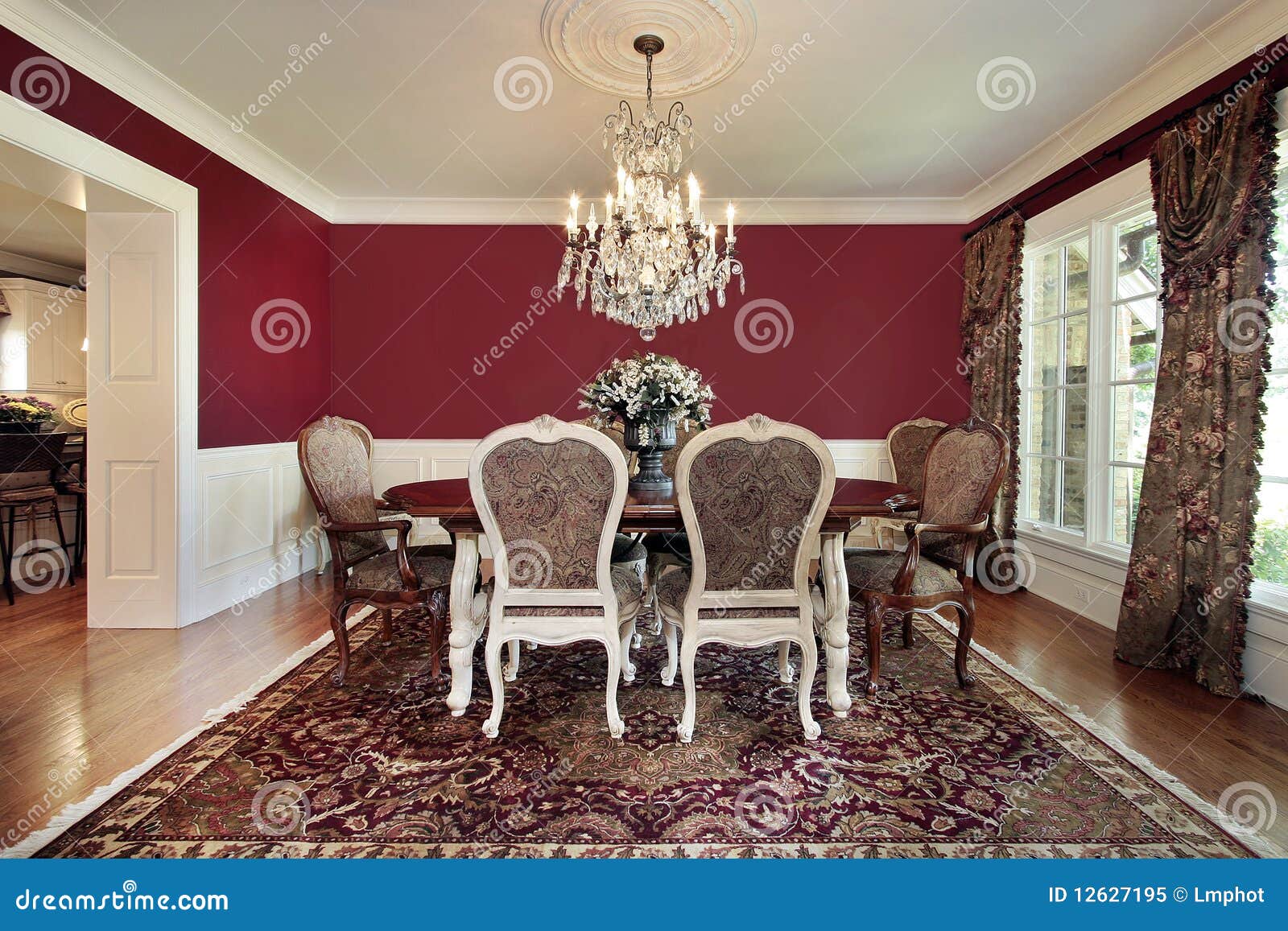 Dining room with red walls stock image. Image of dining 12627195