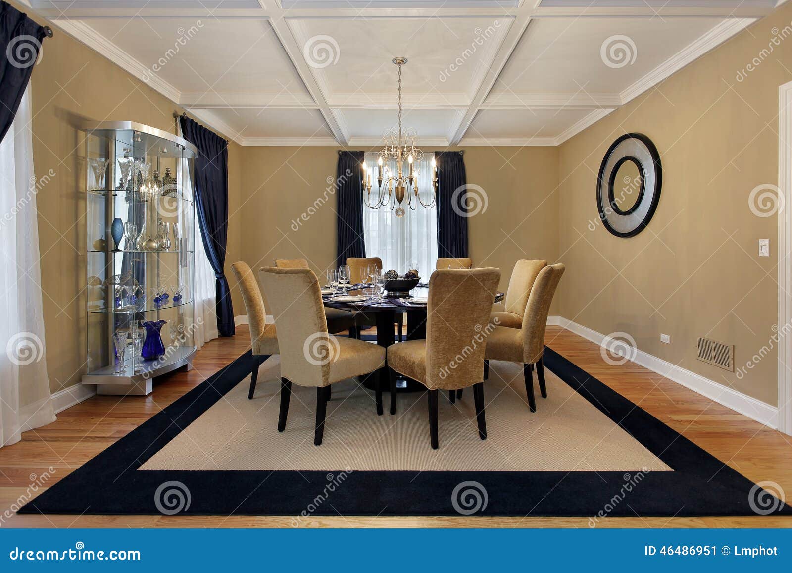 Dining room with tan walls stock image. Image of furniture 46486951
