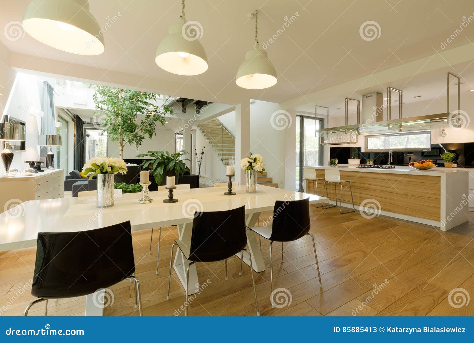 Dining Room with White Table and Black Chairs Stock Image Image of