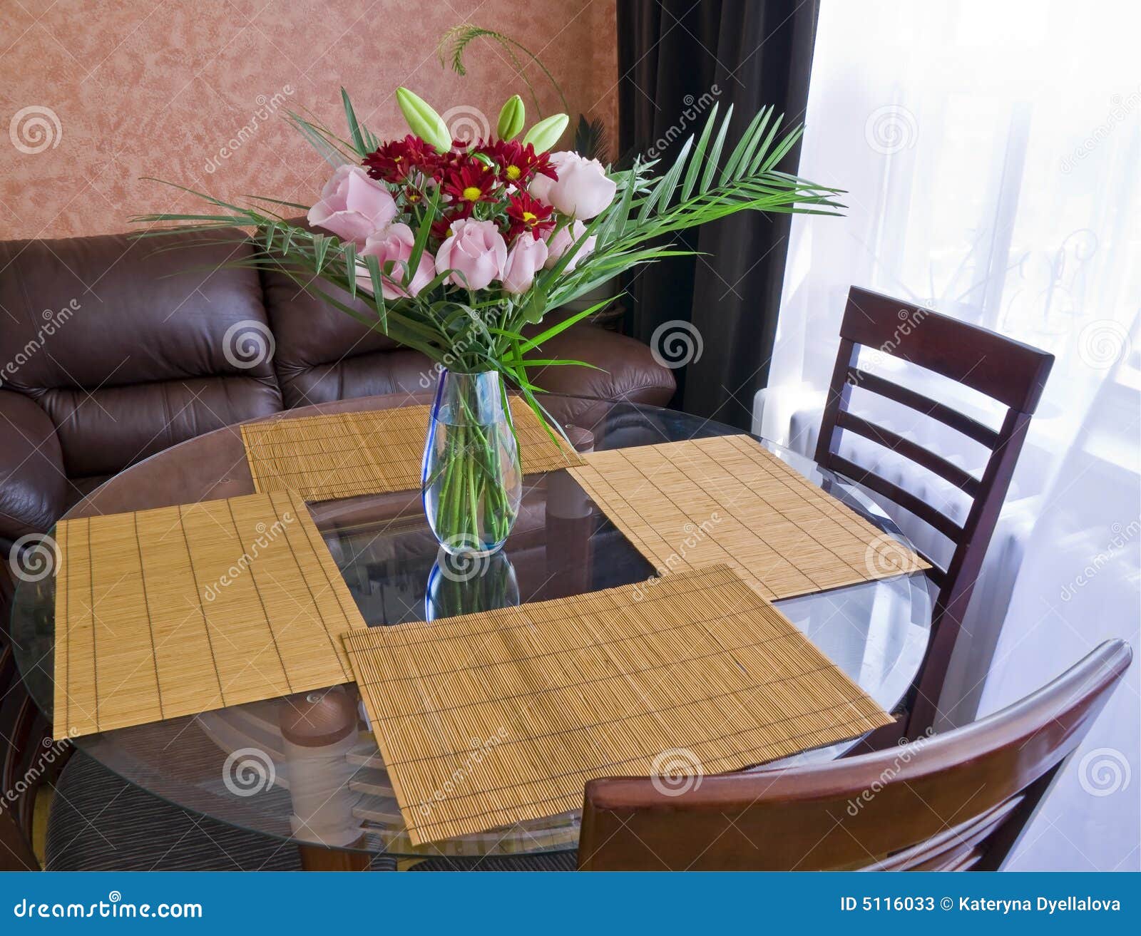 Dining table with flowers stock image. Image of model 5116033