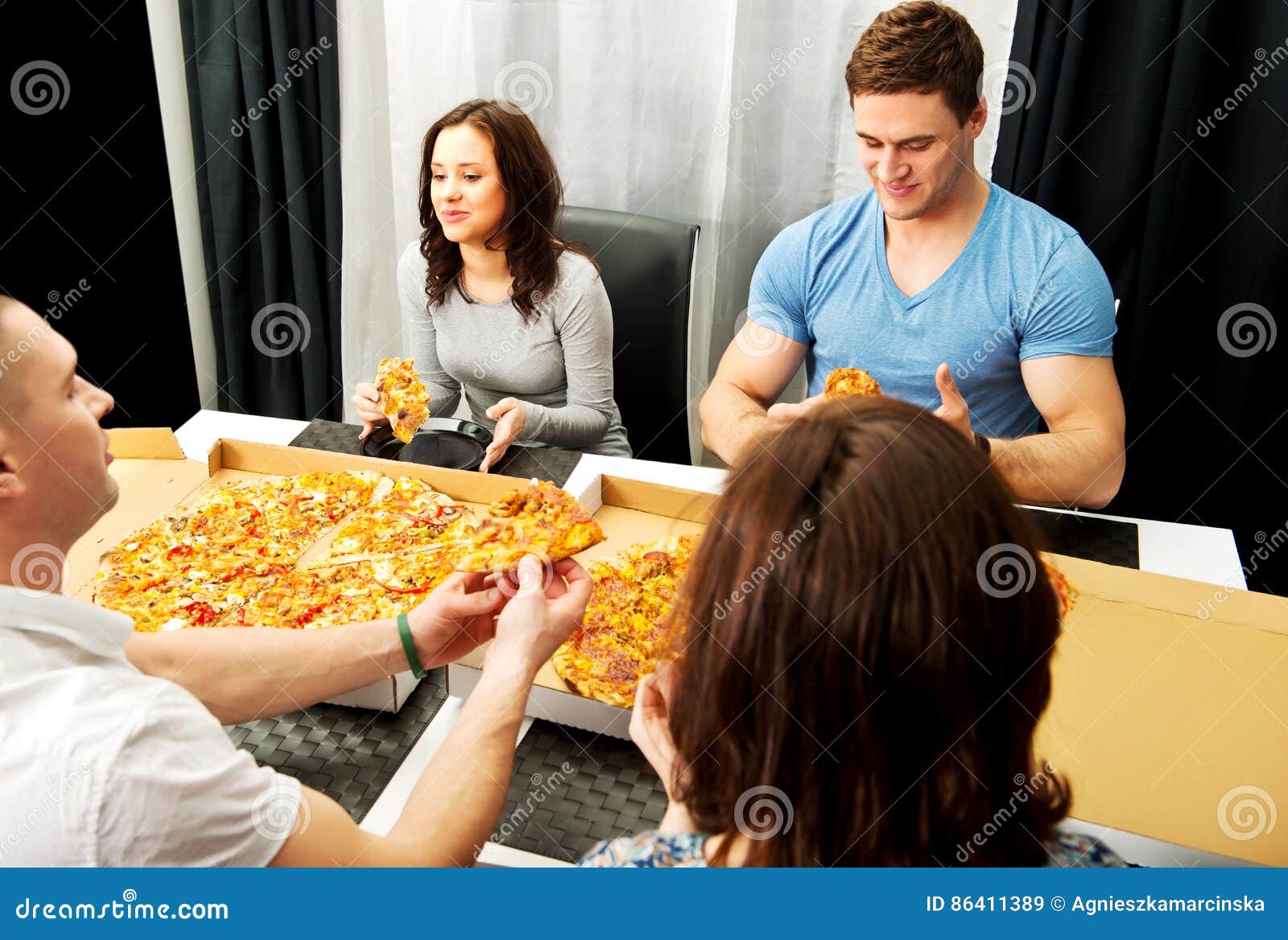 Dinner with friends. stock image. Image of pizza, girl - 86411389