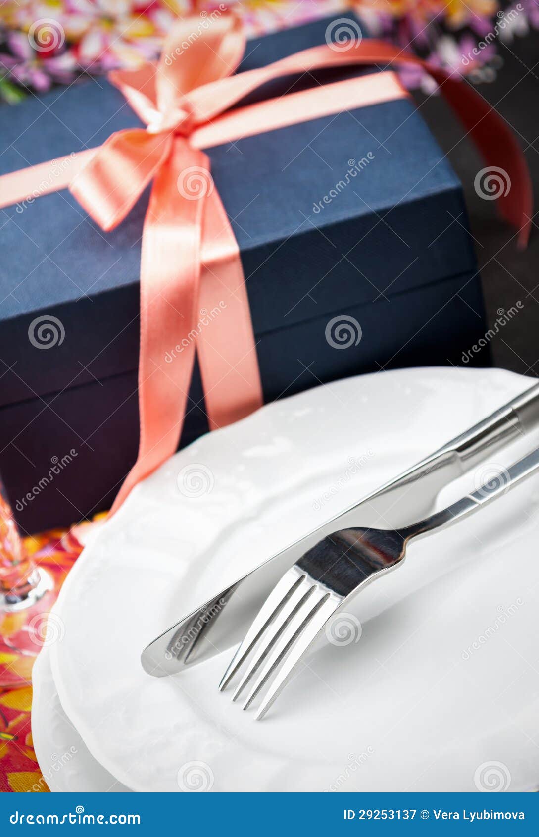 Dinner Plates and Cutlery with a Gift Stock Image Image of holiday, dining 29253137