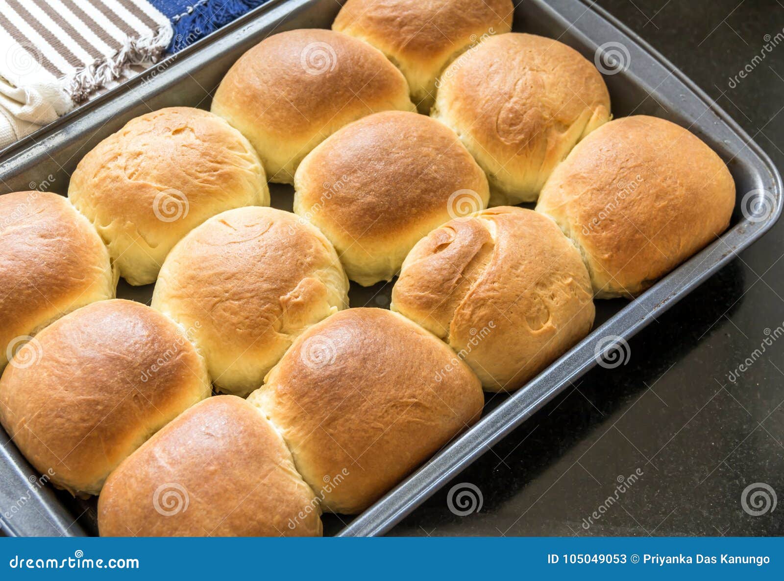 dinner rolls - group of twelve butter bun in a baking tray